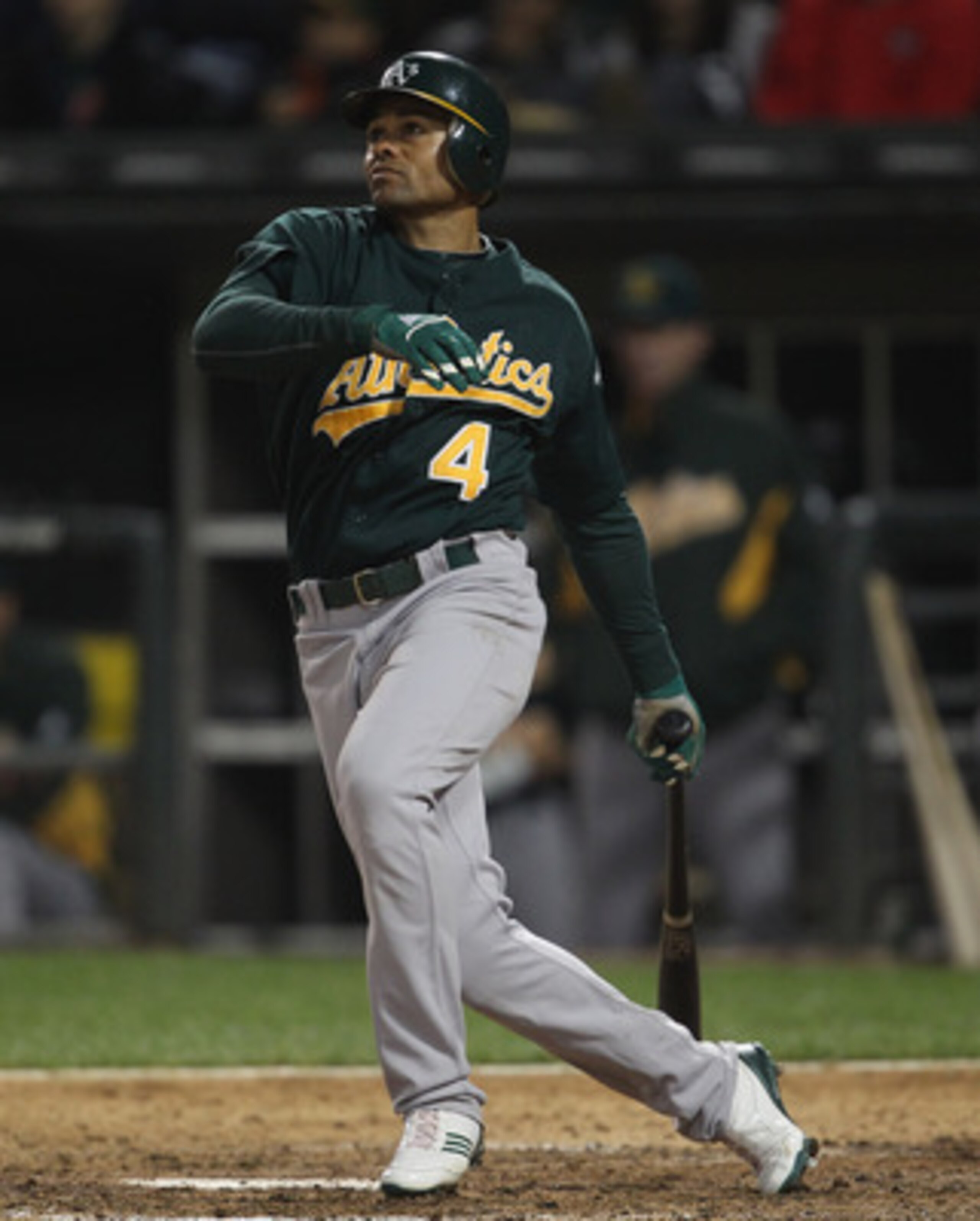 CHICAGO, IL - JUNE 10:  Coco Crisp #4 of the Oakland Athletics hits the ball against the Chicago White Sox at U.S. Cellular Field on June 10, 2011 in Chicago, Illinois. The Athletics defeated the White Sox 7-5.  (Photo by Jonathan Daniel/Getty Images)