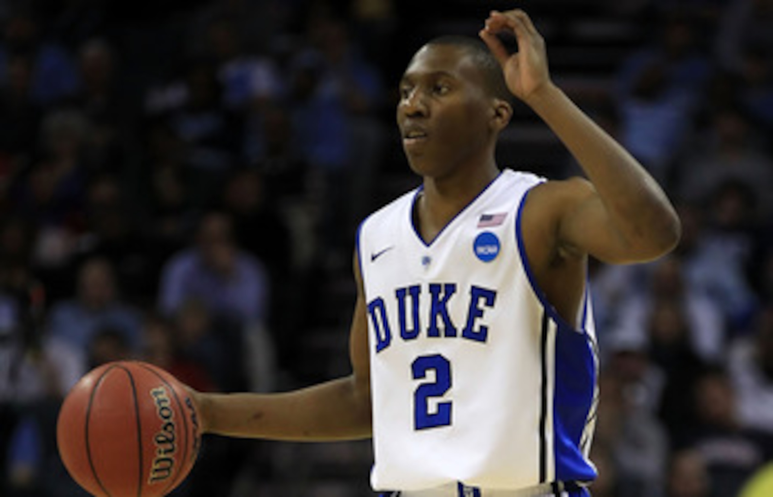 CHARLOTTE, NC - MARCH 20:  Nolan Smith #2 of the Duke Blue Devils moves the ball while taking on the Michigan Wolverines during the third round of the 2011 NCAA men's basketball tournament at Time Warner Cable Arena on March 20, 2011 in Charlotte, North C