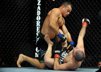 LOS ANGELES, CA - OCTOBER 24:  UFC fighter Gleison Tibau (top) battles with UFC fighter Josh Neer during their Lightweight 'Swing' bout at UFC 104: Machida vs. Shogun at Staples Center on October 24, 2009 in Los Angeles, California.  (Photo by Jon Kopalof