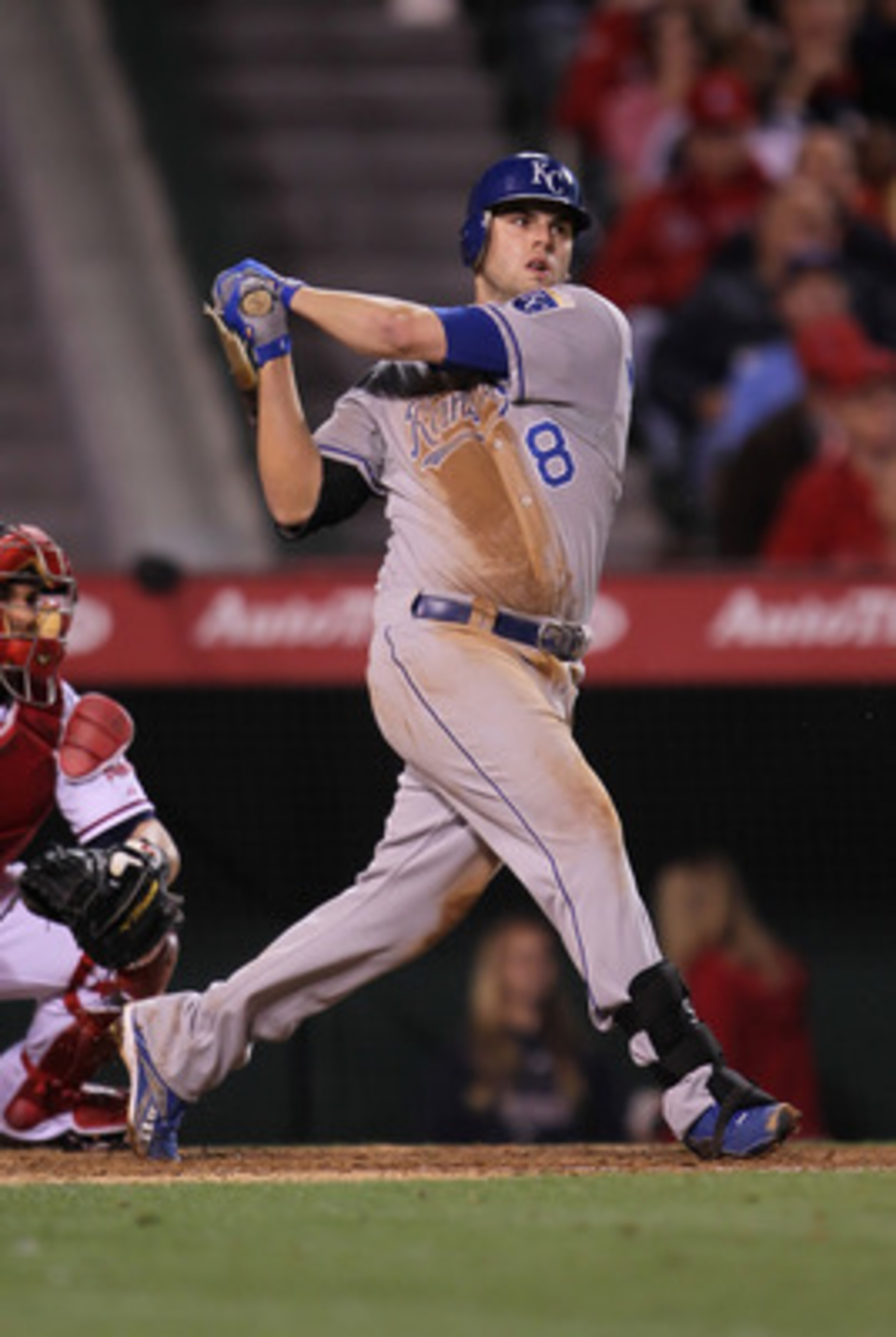 ANAHEIM, CA - JUNE 10:  Mike Moustakas #8 of the Kansas City Royals breaks his bat after hitting a single against the Los Angeles Angels of Anaheim in the sixth inning at Angel Stadium of Anaheim on June 10, 2011 in Anaheim, California.  (Photo by Jeff Gr