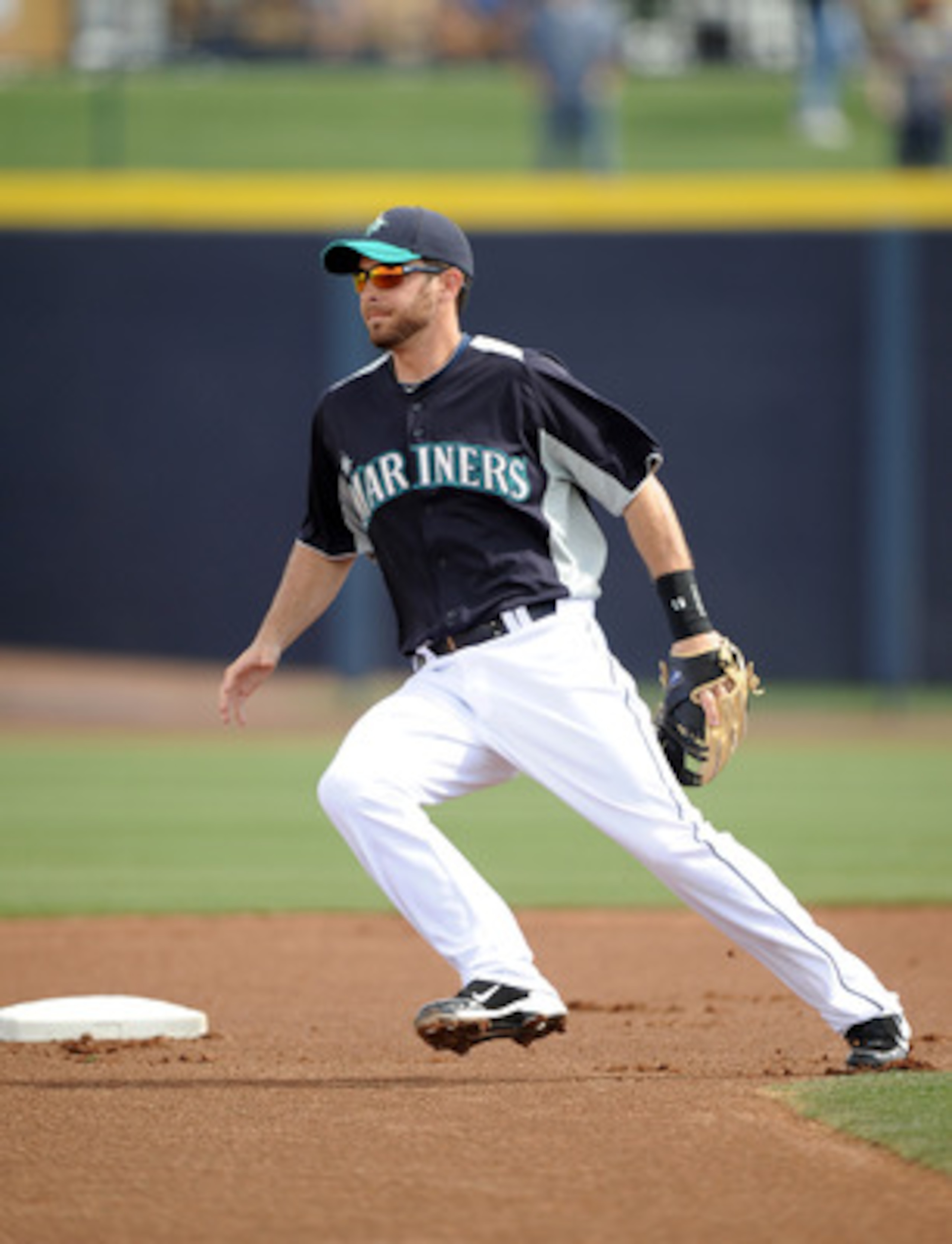 PEORIA, AZ - MARCH 01:  Dustin Ackley #13 of the Seattle Mariners plays second base against the Texas Rangers during spring training at Peoria Stadium on March 1, 2011 in Peoria, Arizona.  (Photo by Harry How/Getty Images)