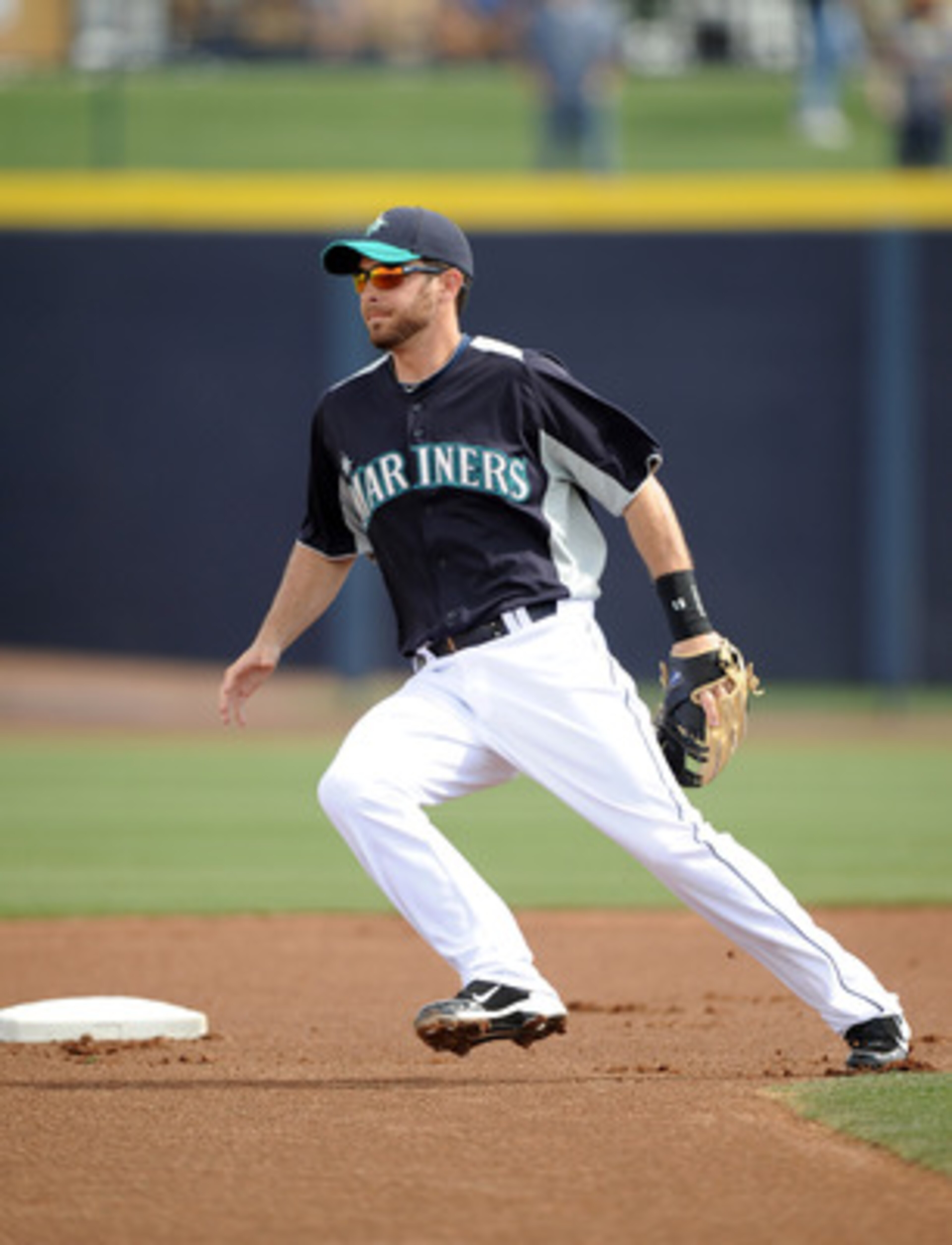 PEORIA, AZ - MARCH 01:  Dustin Ackley #13 of the Seattle Mariners plays second base against the Texas Rangers during spring training at Peoria Stadium on March 1, 2011 in Peoria, Arizona.  (Photo by Harry How/Getty Images)