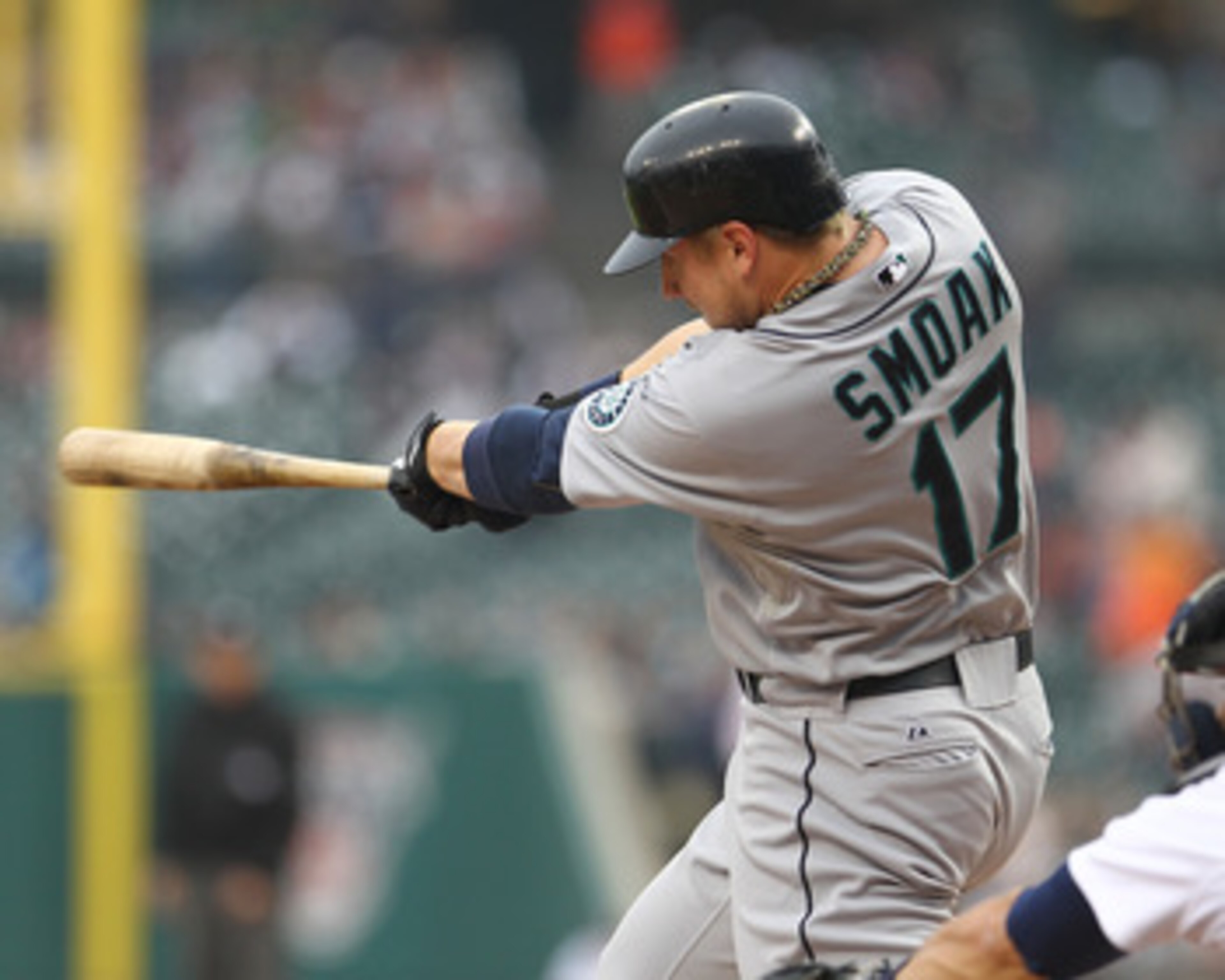 DETROIT, MI - JUNE 10:  First Baseman Justin Smoak #17 of the Seattle Mariners hits a solo home run in the first inning during a MLB game against the Detroit Tigers at Comerica Park on June 10, 2011 in Detroit, Michigan.  Seattle defeated Detroit 3-2.  (P