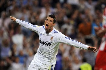 MADRID, SPAIN - MAY 21:  Cristiano Ronaldo of Real Madrid celebrates after scoring his 2nd goal during the La Liga match between Real Madrid and UD Almeria at Estadio Santiago Bernabeu on May 21, 2011 in Madrid, Spain.  (Photo by Denis Doyle/Getty Images)