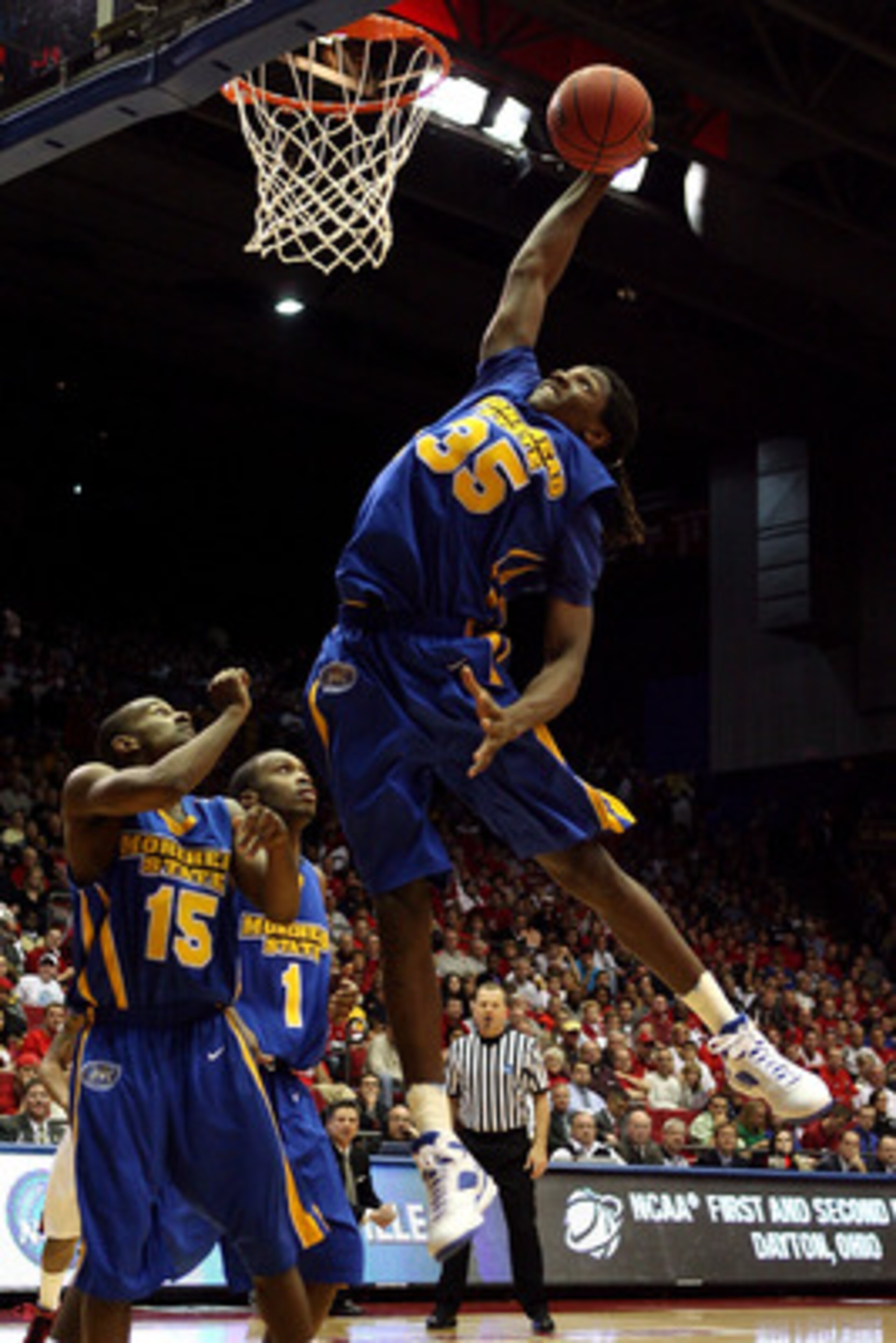 DAYTON, OH - MARCH 20: Kenneth Faried #35 of the Morehead State Eagles drives to the hoop against the Louisville Cardinals during the first round of the NCAA Division I Men's Basketball Tournament at the University of Dayton Arena on March 20, 2009 in Day DAYTON, OH - MARCH 20: Kenneth Faried #35 of the Morehead State Eagles drives to the hoop against the Louisville Cardinals during the first round of the NCAA Division I Men's Basketball Tournament at the University of Dayton Arena on March 20, 2009 in Day