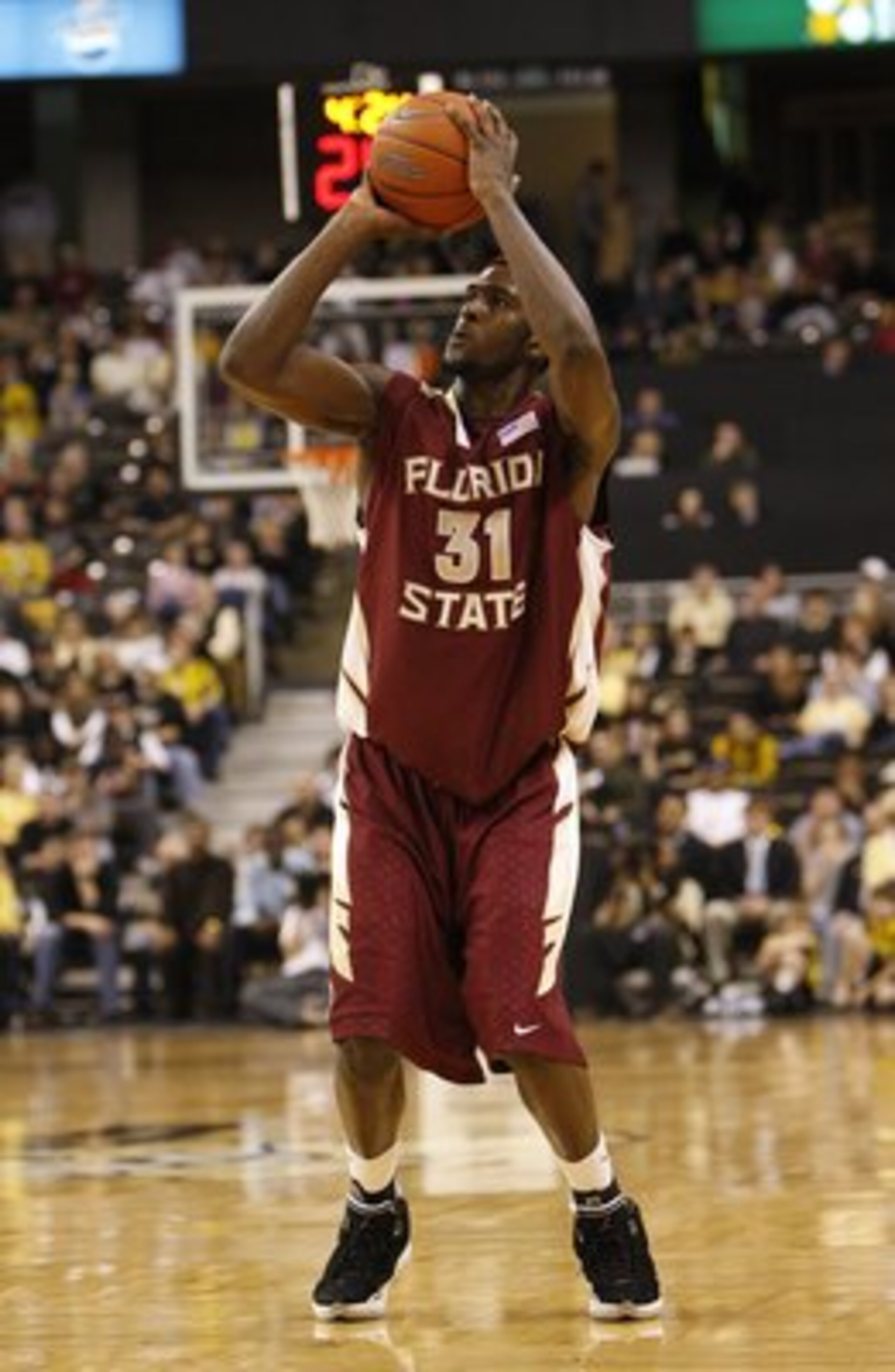 WINSTON-SALEM, NC - FEBRUARY 14: Chris Singleton #31 of the Florida State Seminoles sets up for an outside shot during their game against the Wake Forest Demon Deacons on February 14, 2009 in Winston-Salem, North Carolina. The Demon Deacons defeated the WINSTON-SALEM, NC - FEBRUARY 14: Chris Singleton #31 of the Florida State Seminoles sets up for an outside shot during their game against the Wake Forest Demon Deacons on February 14, 2009 in Winston-Salem, North Carolina. The Demon Deacons defeated the