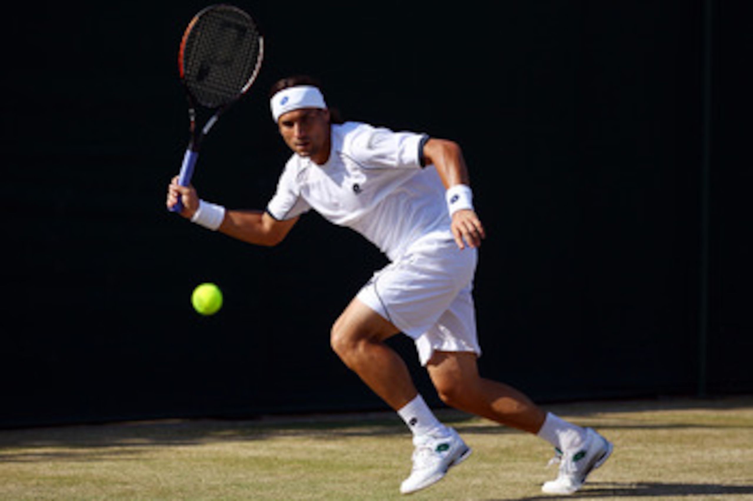 LONDON, ENGLAND - JUNE 28:  David Ferrer of Spain in action during his match against Robin Soderling of Sweden on Day Seven of the Wimbledon Lawn Tennis Championships at the All England Lawn Tennis and Croquet Club on June 28, 2010 in London, England.  (P