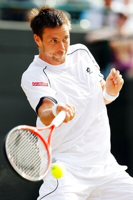 LONDON, ENGLAND - JUNE 30: Robin Soderling of Sweden plays a shot during his Quarter Final match against Rafael Nadal of Spain on Day Nine of the Wimbledon Lawn Tennis Championships at the All England Lawn Tennis and Croquet Club on June 30, 2010 in Lond LONDON, ENGLAND - JUNE 30: Robin Soderling of Sweden plays a shot during his Quarter Final match against Rafael Nadal of Spain on Day Nine of the Wimbledon Lawn Tennis Championships at the All England Lawn Tennis and Croquet Club on June 30, 2010 in Lond