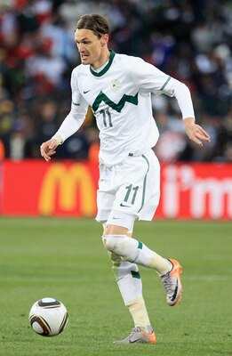 JOHANNESBURG, SOUTH AFRICA - JUNE 18:  Milivoje Novakovic of Slovenia in action during the 2010 FIFA World Cup South Africa Group C match between Slovenia and USA at Ellis Park Stadium on June 18, 2010 in Johannesburg, South Africa.  (Photo by David Canno
