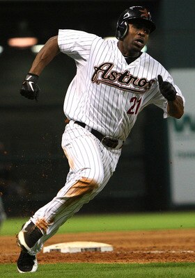 HOUSTON - JUNE 13:  Michael Bourn #21 of the Houston Astros scores in the sixth inning on a Hunter Pence single against the Atlanta Braves at Minute Maid Park on June 13, 2011 in Houston, Texas.  (Photo by Bob Levey/Getty Images)