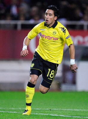 SEVILLE, SPAIN - DECEMBER 15:  Lucas Barrios of Borussia Dortmund runs during the UEFA Europa League group J match between Sevilla and Borussia Dortmund at Estadio Ramon Sanchez Pizjuan on December 15, 2010 in Seville, Spain. The match ended 2-2.  (Photo