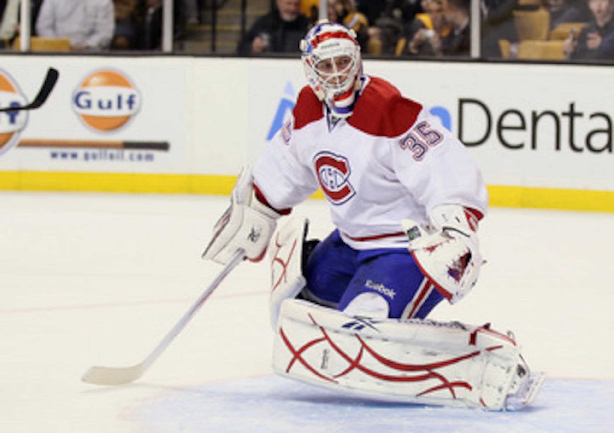 BOSTON, MA - MARCH 24:  Alex Auld #35 of the Montreal Canadiens stops a shot in the third period by the Boston Bruins on March 24, 2011 at the TD Garden in Boston, Massachusetts.  The Boston Bruins defeated the Montreal Canadiens 7-0.  (Photo by Elsa/Gett