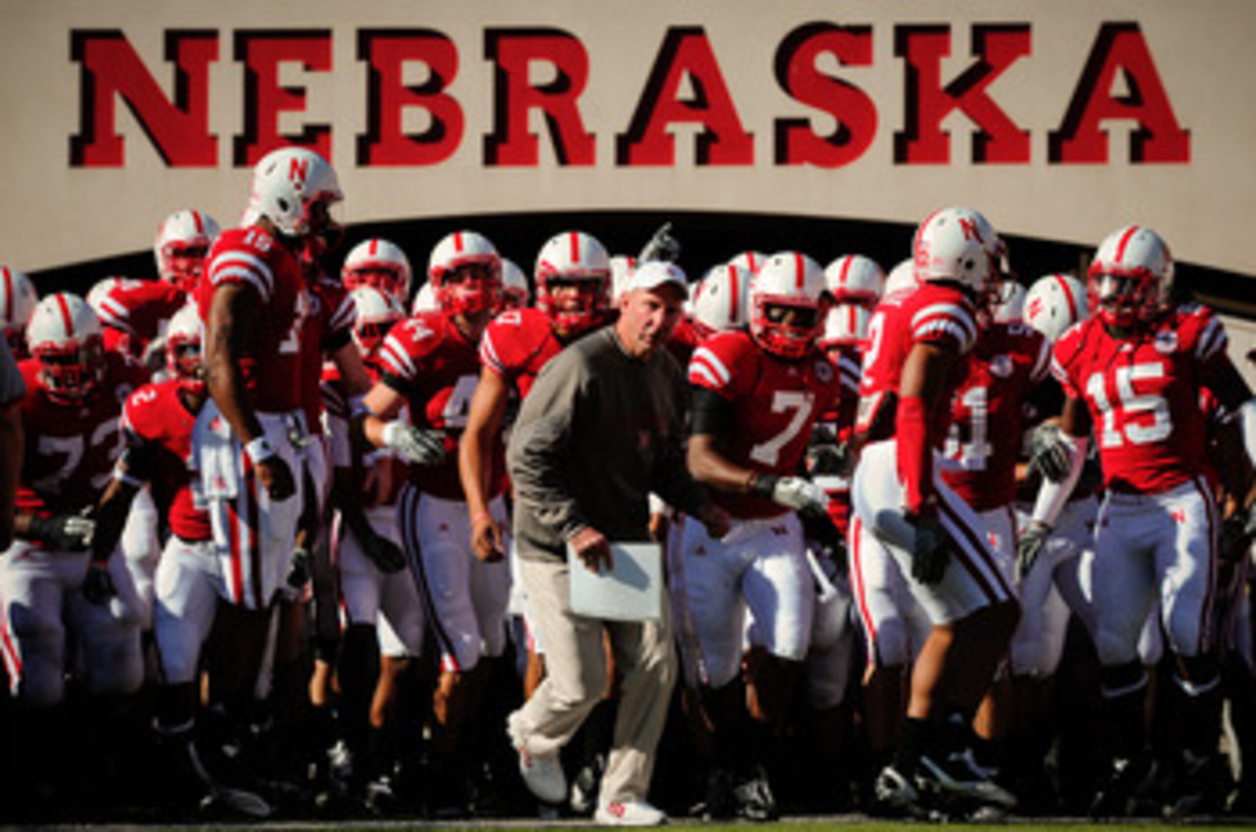LINCOLN, NE - OCTOBER 30: Coach Bo Pelini  leads his Nebraska Cornhusker football team on the field against the Missouri Tigers at Memorial Stadium on October 30, 2010 in Lincoln, Nebraska. Nebraska Defeated Missouri 31-17. (Photo by Eric Francis/Getty Im