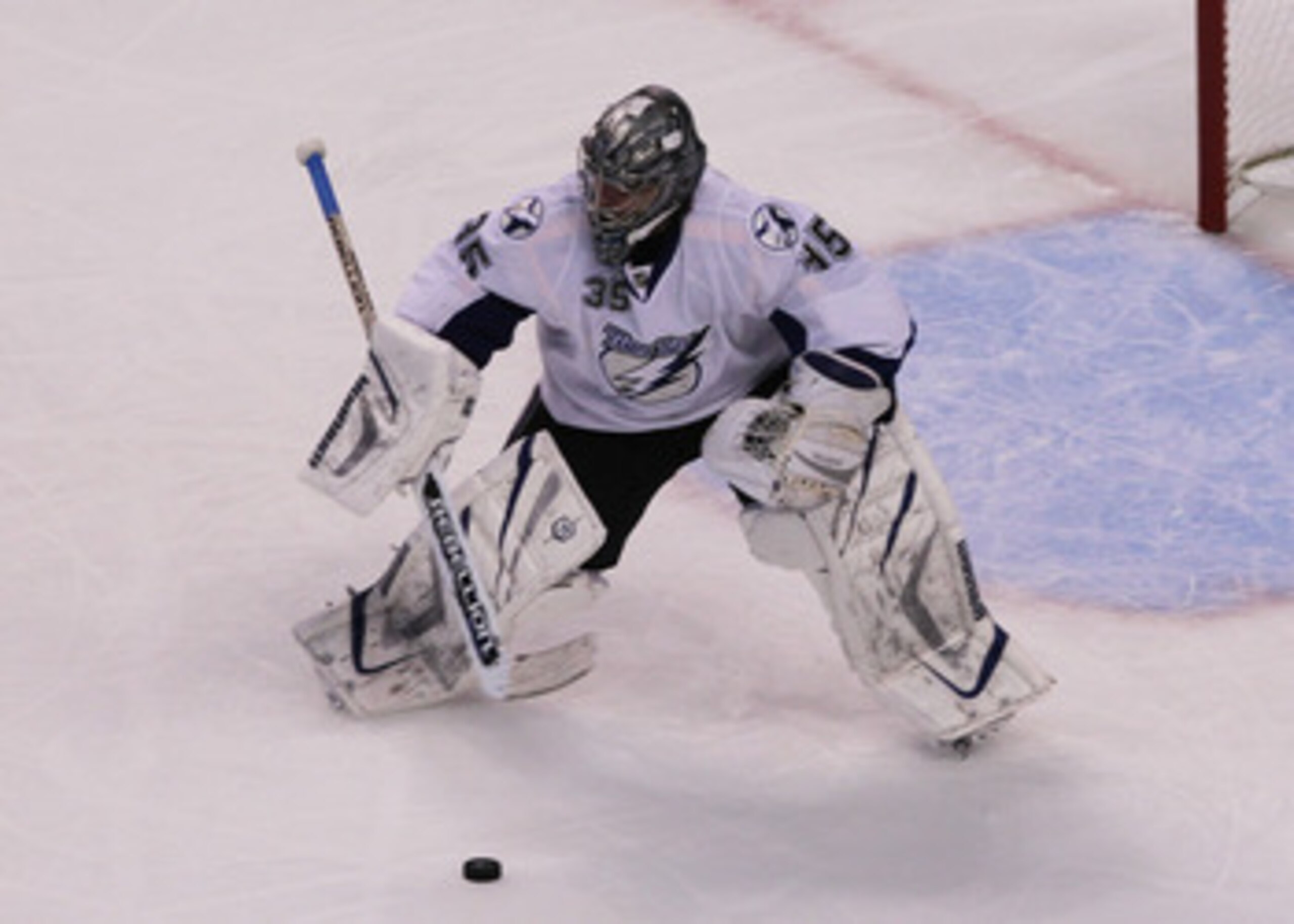 BOSTON, MA - MAY 27:  Dwayne Roloson #35 of the Tampa Bay Lightning stops a puck in Game Seven of the Eastern Conference Finals against the Boston Bruins during the 2011 NHL Stanley Cup Playoffs at TD Garden on May 27, 2011 in Boston, Massachusetts.  (Pho