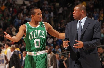 DENVER, CO - FEBRUARY 24:  Avery Bradley #0 and head coach Doc Rivers of the Boston Celtics talk as they leave the court after facing the Denver Nuggets during NBA action at the Pepsi Center on February 24, 2011 in Denver, Colorado. The Nuggets defeated t