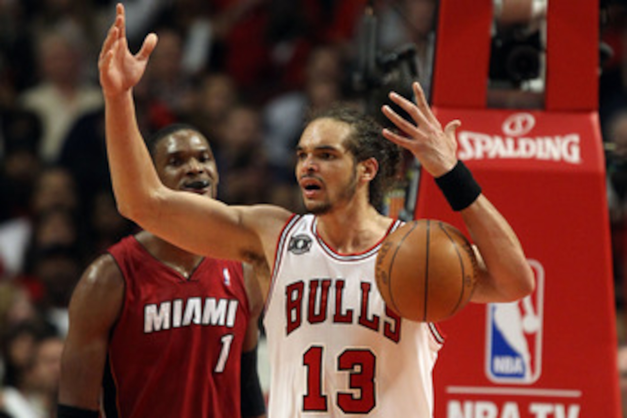 CHICAGO, IL - MAY 26:  Joakim Noah #13 of the Chicago Bulls reacts against the Miami Heat in Game Five of the Eastern Conference Finals during the 2011 NBA Playoffs on May 26, 2011 at the United Center in Chicago, Illinois. NOTE TO USER: User expressly ac