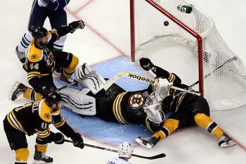 BOSTON, MA - JUNE 13:  Tim Thomas #30 of the Boston Bruins gets scored on by the Vancouver Canucks during Game Six of the 2011 NHL Stanley Cup Final at TD Garden on June 13, 2011 in Boston, Massachusetts.  (Photo by Jim Rogash/Getty Images)