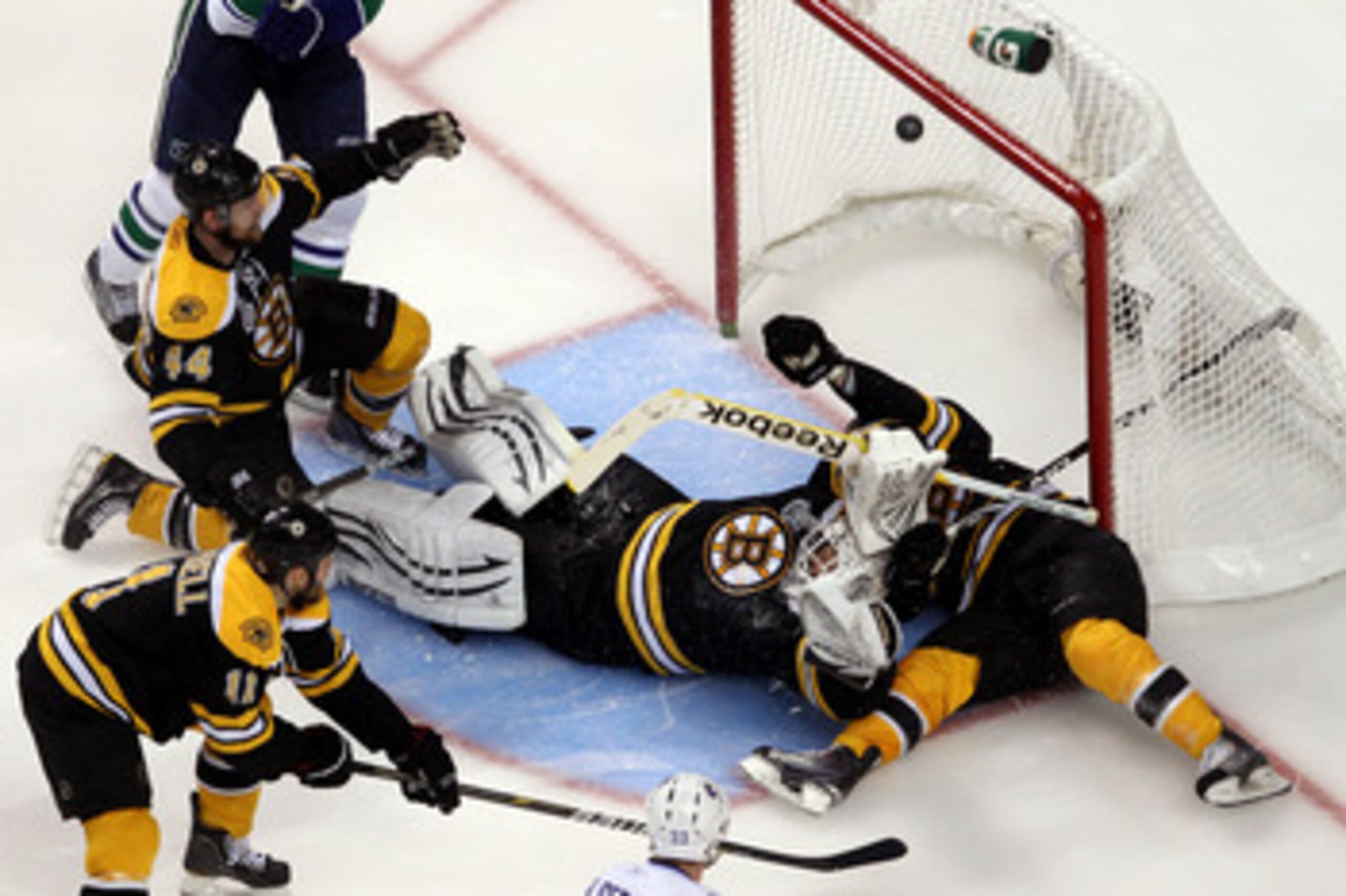 BOSTON, MA - JUNE 13: Tim Thomas #30 of the Boston Bruins gets scored on by the Vancouver Canucks during Game Six of the 2011 NHL Stanley Cup Final at TD Garden on June 13, 2011 in Boston, Massachusetts. (Photo by Jim Rogash/Getty Images) BOSTON, MA - JUNE 13: Tim Thomas #30 of the Boston Bruins gets scored on by the Vancouver Canucks during Game Six of the 2011 NHL Stanley Cup Final at TD Garden on June 13, 2011 in Boston, Massachusetts. (Photo by Jim Rogash/Getty Images)