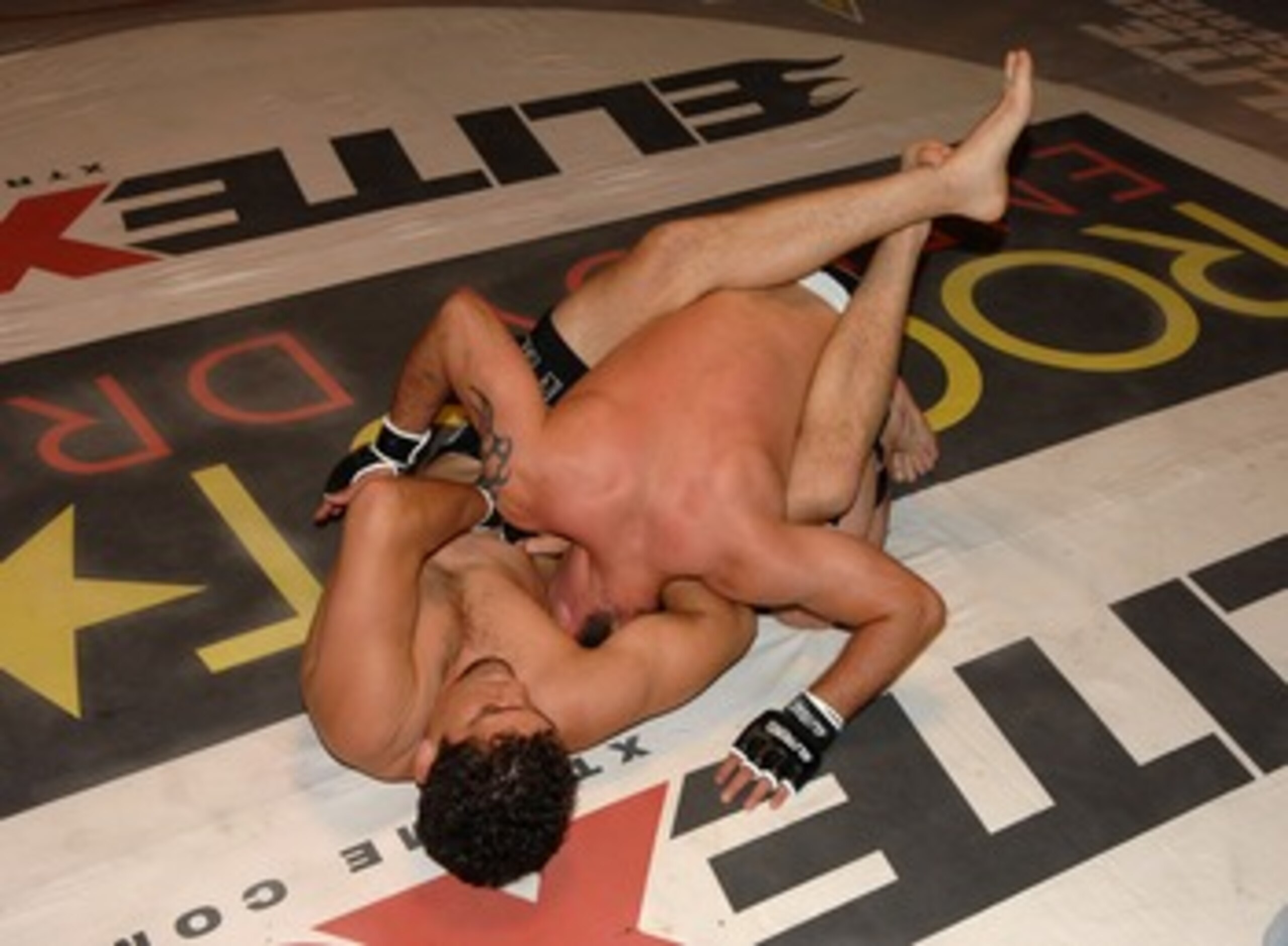STUDIO CITY, CA - MAY 19:  MMA fighters Jake Shields (top) and Nick Diaz demonstrate MMA fighting techniques at CBS's 'Elite XC Saturday Night Fights' Press Conference at CBS Radford Studios on May 19, 2008 in Studio City, California.  (Photo by Stephen S