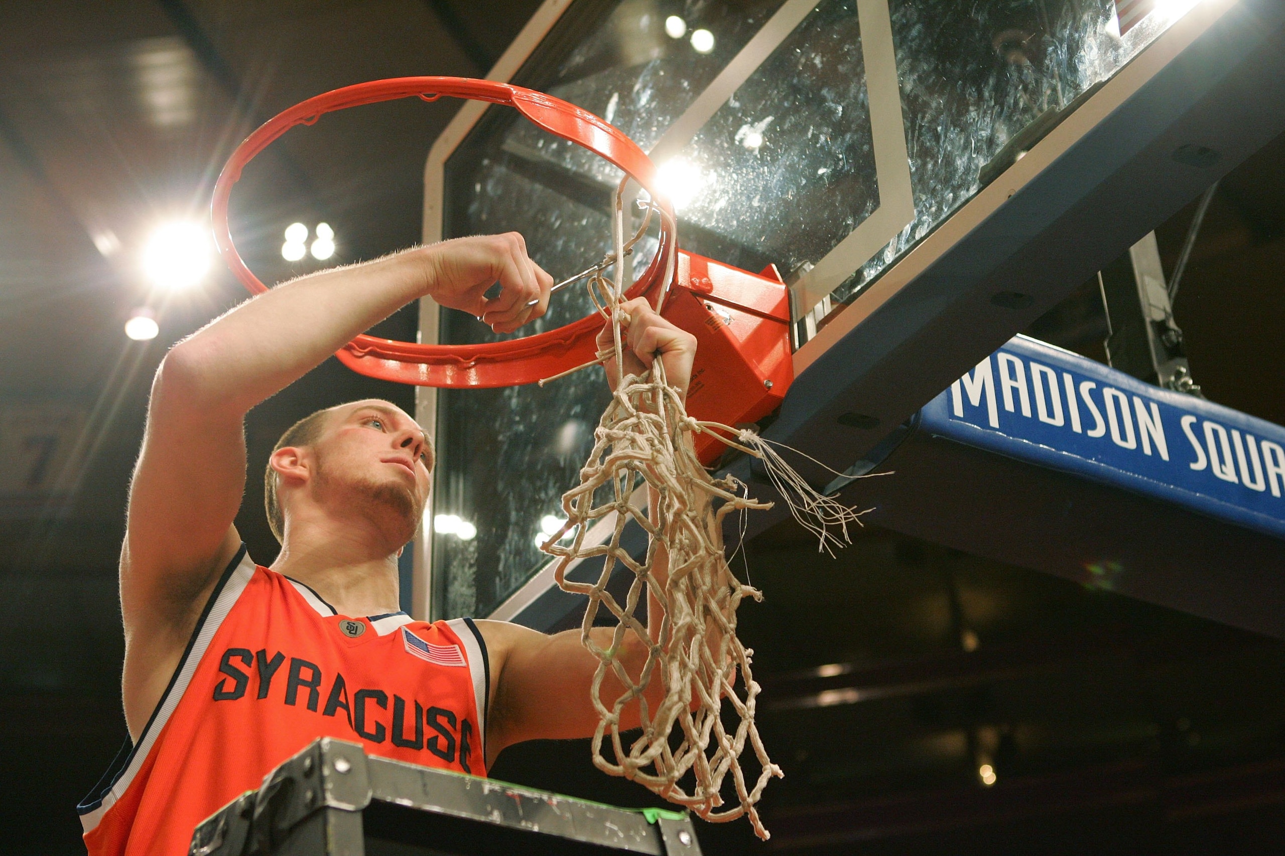 NEW YORK - MARCH 11:  Gerry McNamara #3 of the Syracuse Orange clips the net from a basket after defeating the Pittsburgh Panthers 65-61 in the Big East Men's Basketball Championship Final at Madison Square Garden on March 11, 2006 in New York City. McNam