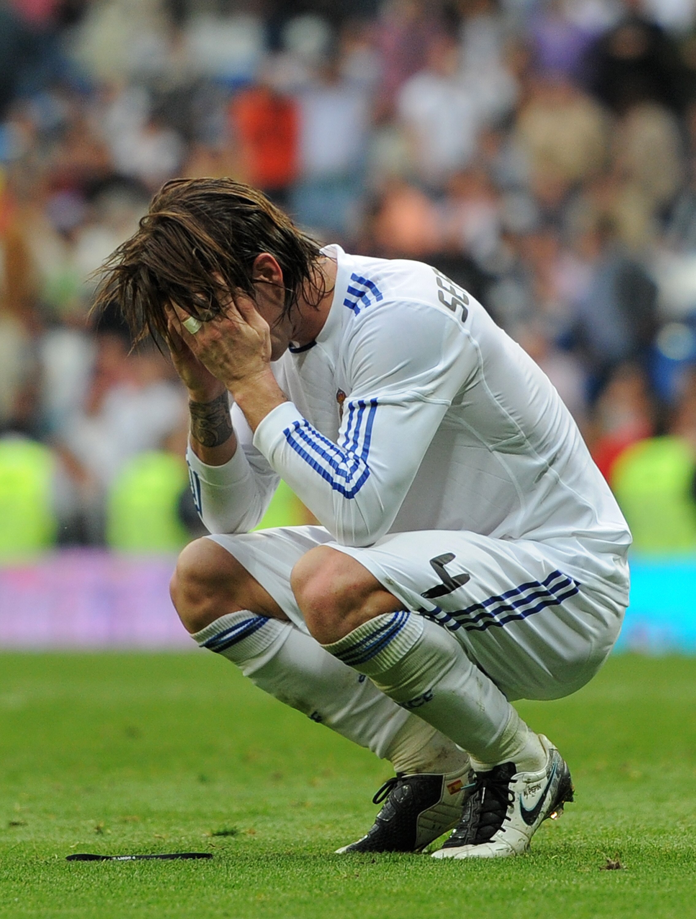 MADRID, SPAIN - APRIL 02:  Sergio Ramos of Real Madrid reacts at the end of the la Liga match between Real Madrid and Sporting Gijon at Estadio Santiago Bernabeu on April 2, 2011 in Madrid, Spain.  (Photo by Jasper Juinen/Getty Images)