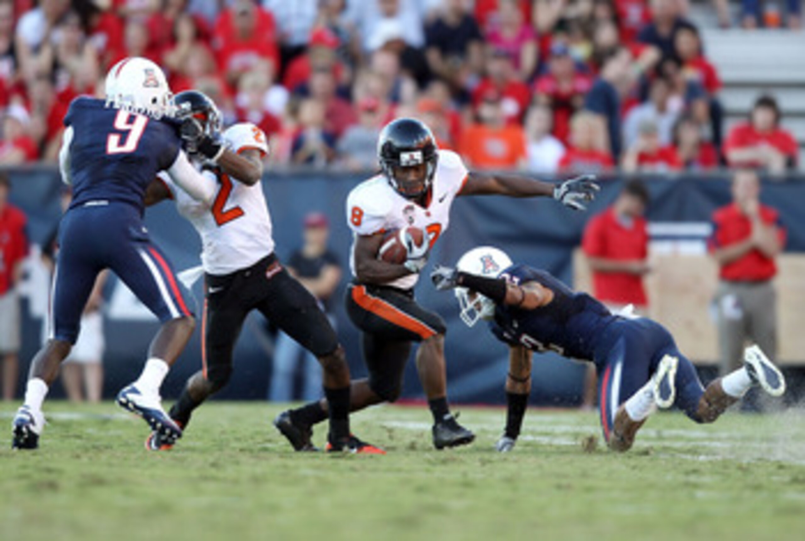 TUCSON, AZ - OCTOBER 09: Wide receiver James Rodgers #8 of the Oregon State Beavers runs with the football during the college football game against the Arizona Wildcats at Arizona Stadium on October 9, 2010 in Tucson, Arizona. The Beavers defeated the Wi TUCSON, AZ - OCTOBER 09: Wide receiver James Rodgers #8 of the Oregon State Beavers runs with the football during the college football game against the Arizona Wildcats at Arizona Stadium on October 9, 2010 in Tucson, Arizona. The Beavers defeated the Wi