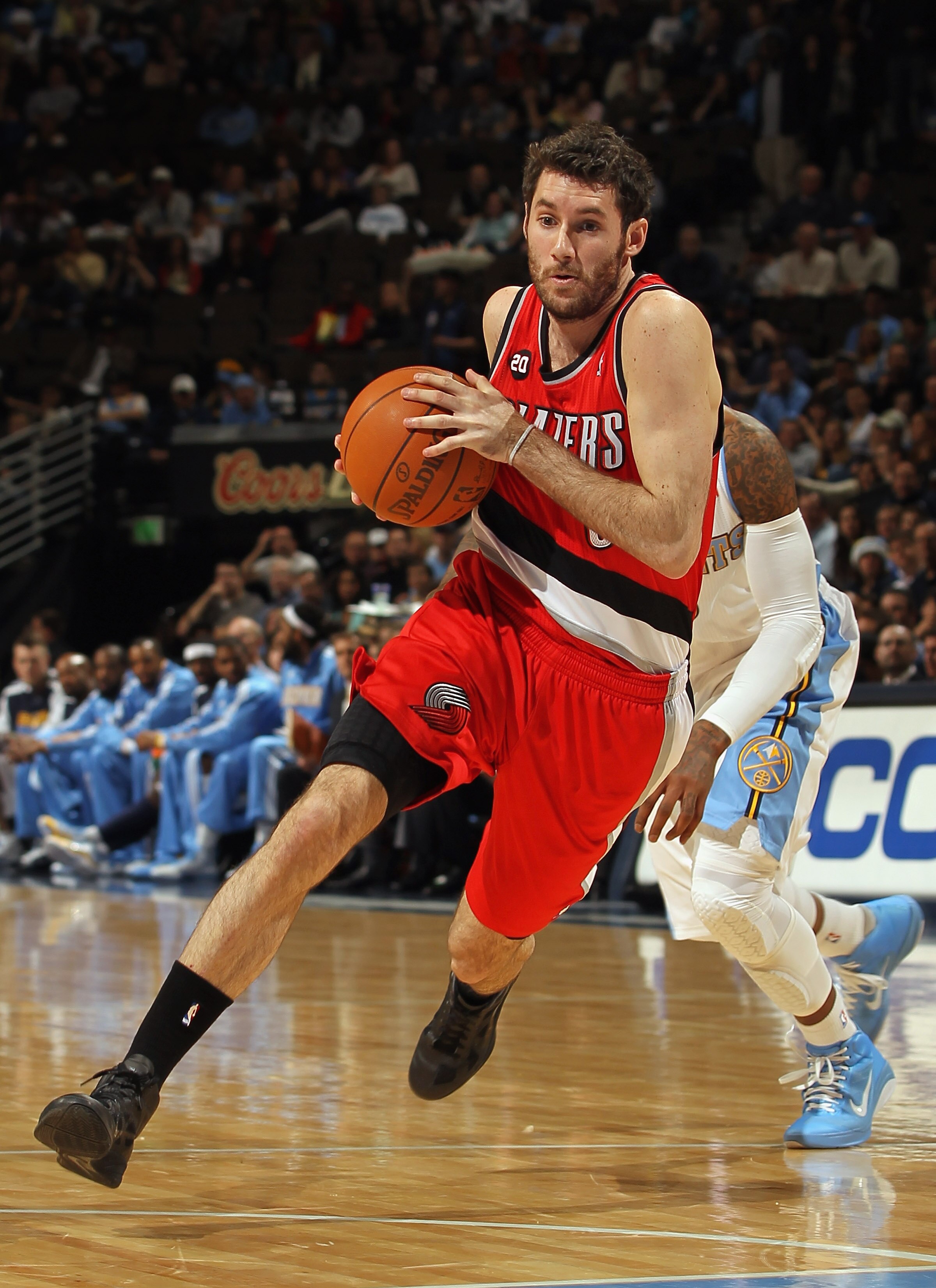 DENVER - DECEMBER 28:  Rudy Fernandez #5 of the Portland Trail Blazers dribbles the ball against the Denver Nuggets at Pepsi Center on December 28, 2010 in Denver, Colorado. The Nuggets defeated the Blazers 95-77. NOTE TO USER: User expressly acknowledges