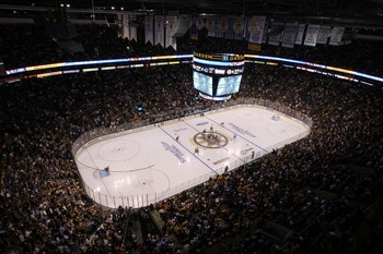 BOSTON, MA - JUNE 13:  Patrice Bergeron #37 of the Boston Bruins faces off against Ryan Kesler #17 of the Vancouver Canucks to start Game Six of the 2011 NHL Stanley Cup Final at TD Garden on June 13, 2011 in Boston, Massachusetts.  (Photo by Jim Rogash/G
