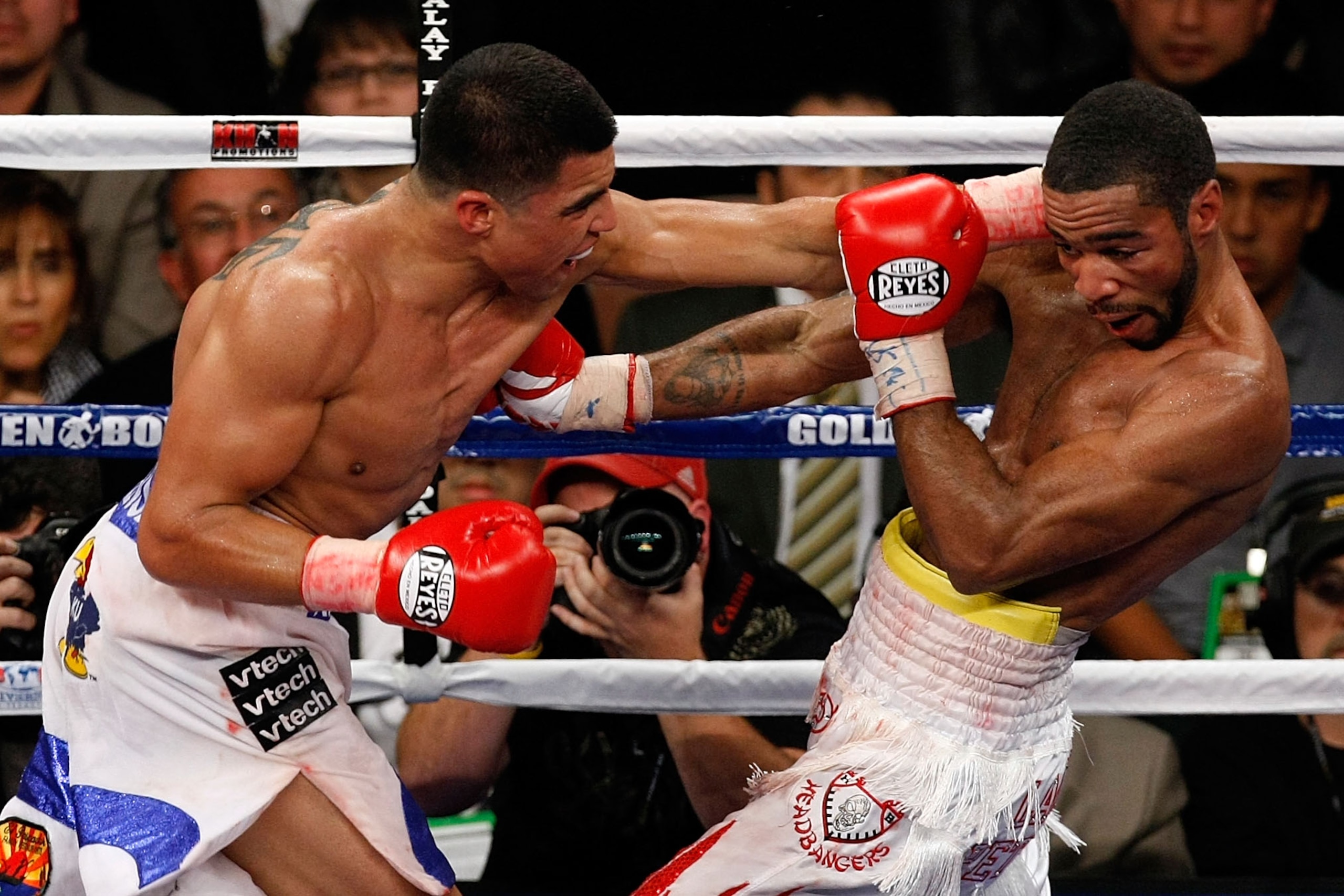 LAS VEGAS - DECEMBER 11:  (L-R) Victor Ortiz and Lamont Petersen exchange blows during the super lightweight fight at Mandalay Bay Events Center on December 11, 2010 in Las Vegas, Nevada.  (Photo by Ethan Miller/Getty Images)
