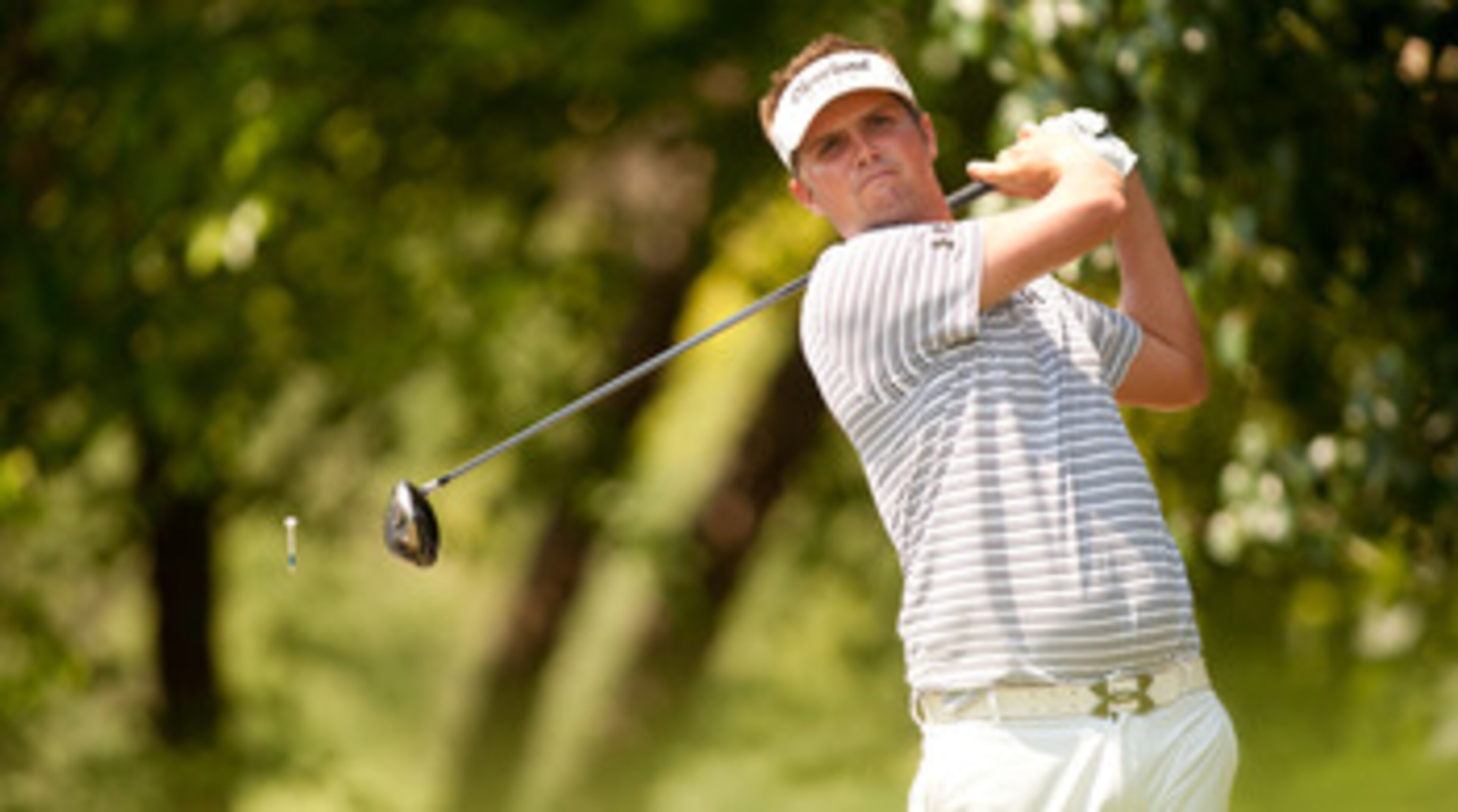 IRVING, TX - MAY 28: Jeff Overton follows through on a tee shot during the third round of the HP Byron Nelson Championship at TPC Four Seasons at Las Colinas on May 28, 2011 in Irving, Texas. (Photo by Darren Carroll/Getty Images)
