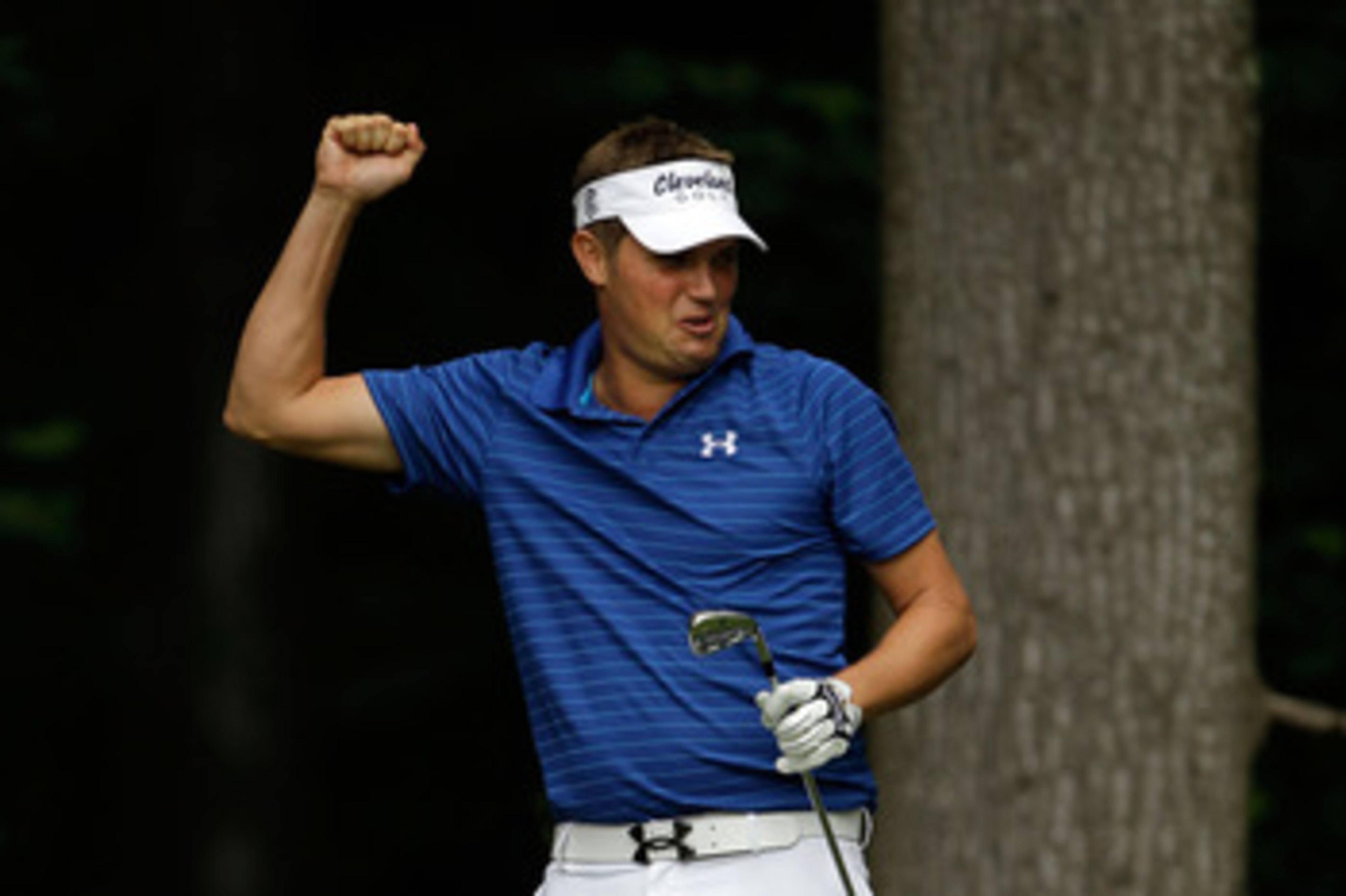 BETHESDA, MD - JUNE 14:  Jeff Overton celebrates a hole-in-one on the 13th hole during a practice round prior to the start of the 111th U.S. Open at Congressional Country Club on June 14, 2011 in Bethesda, Maryland.  (Photo by Rob Carr/Getty Images)