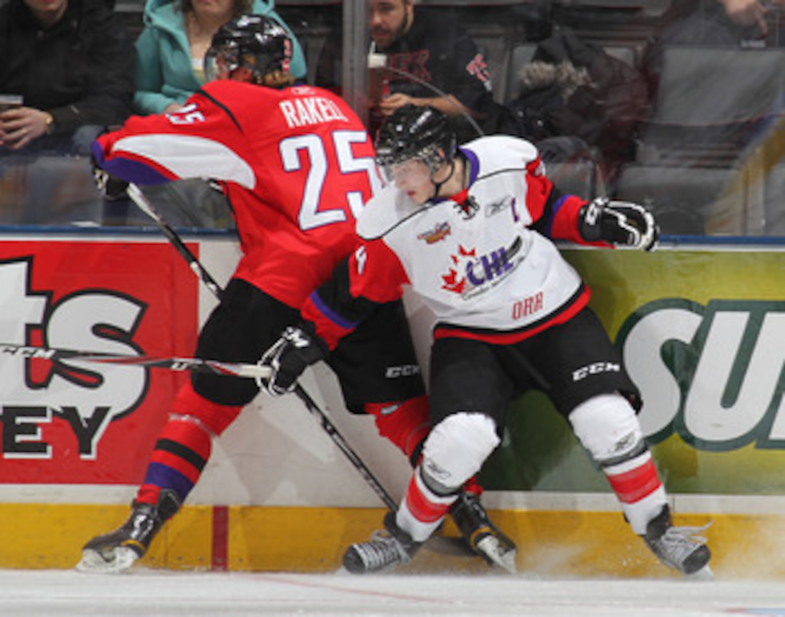 TORONTO, CAN - JANUARY 19:  Rickard Rakell #25 of Team Cherry stops Ryan Nugent-Hopkins #9 of Team Orr from getting to the puck in the 2011 Home Hardware Top Prospects game on January 19, 2011 at the Air Canada Centre in Toronto, Canada. Team Orr defeated