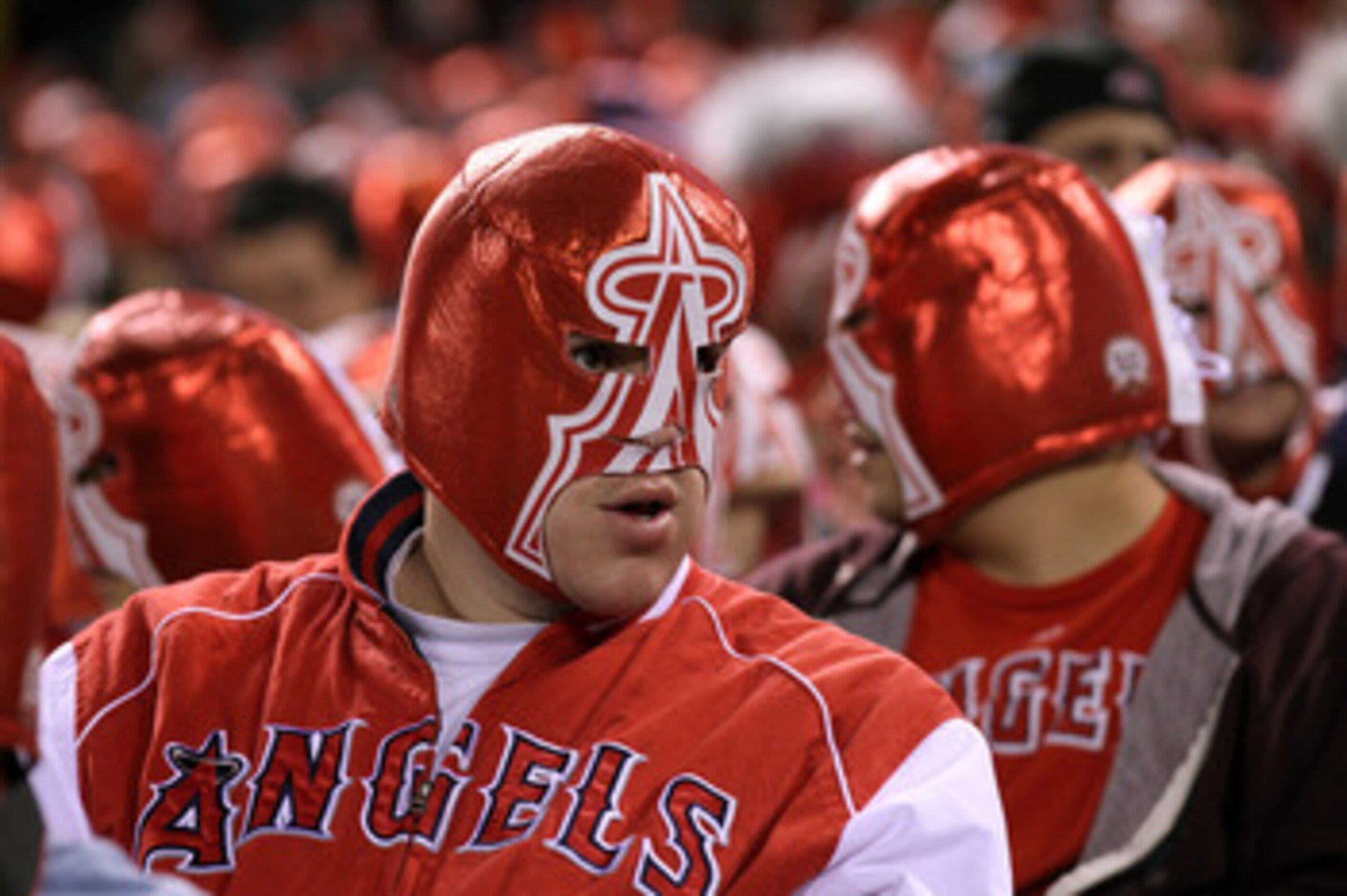 ANAHEIM, CA - MAY 10:  Fans wear wrestling masks given away as a promotion as they set a Guinness World Record for 'largest gathering of people wearing costume masks' during the game between the Chicago White Sox and the Los Angeles Angels of Anaheim on M