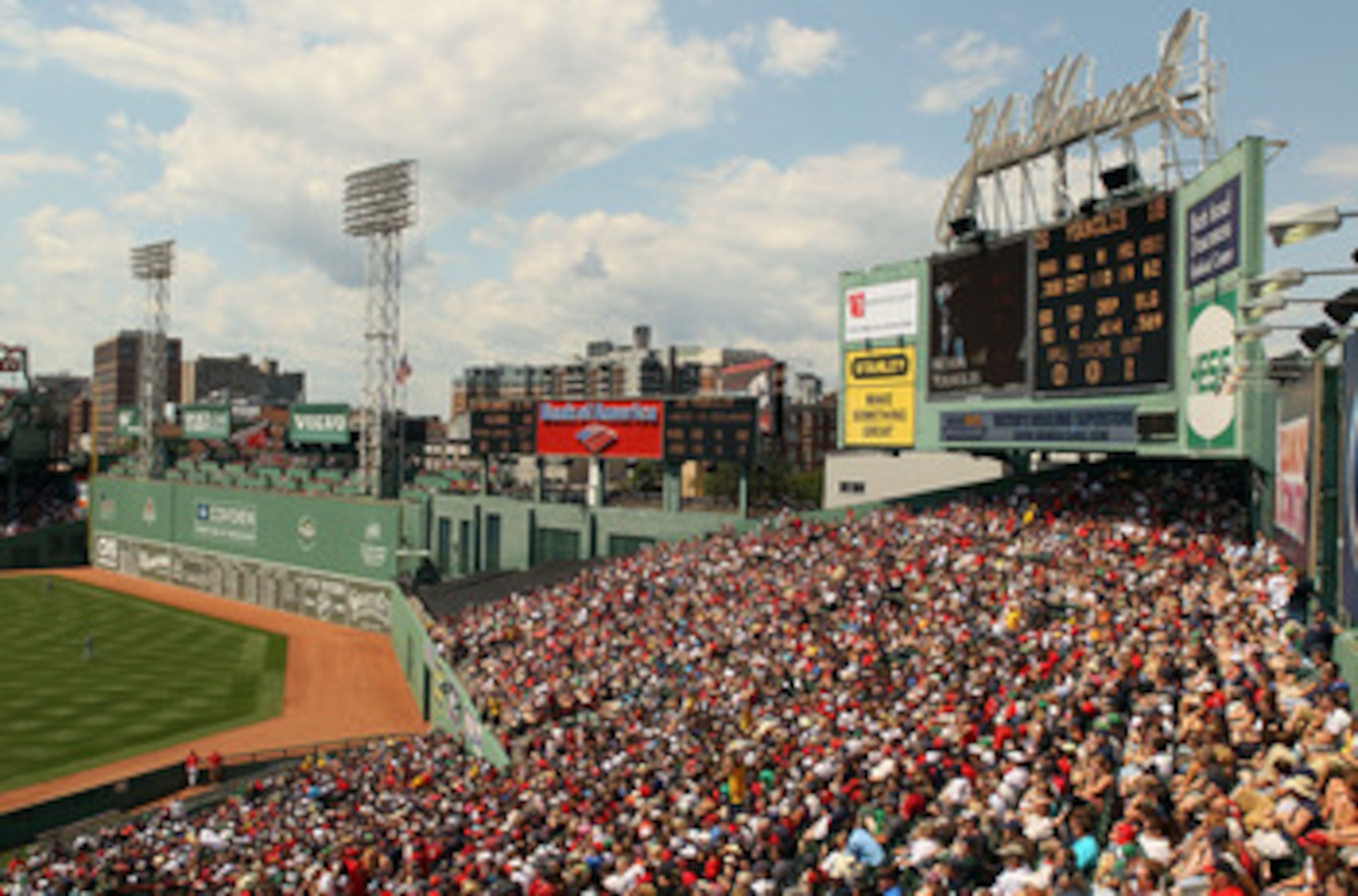BOSTON - AUGUST 01:  Fans enjoy the game between the Detroit Tigers and the Boston Red Sox from the bleacher seats on August 1, 2010 at Fenway Park in Boston, Massachusetts.  (Photo by Elsa/Getty Images)
