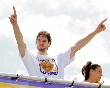 LOS ANGELES, CA - JUNE 21:  Los Angeles Lakers forward Pau Gasol salutes the crowd while riding in the victory parade for the the NBA basketball champion team on June 21, 2010 in Los Angeles, California. The Lakers beat the Boston Celtics 87-79 in 7 games
