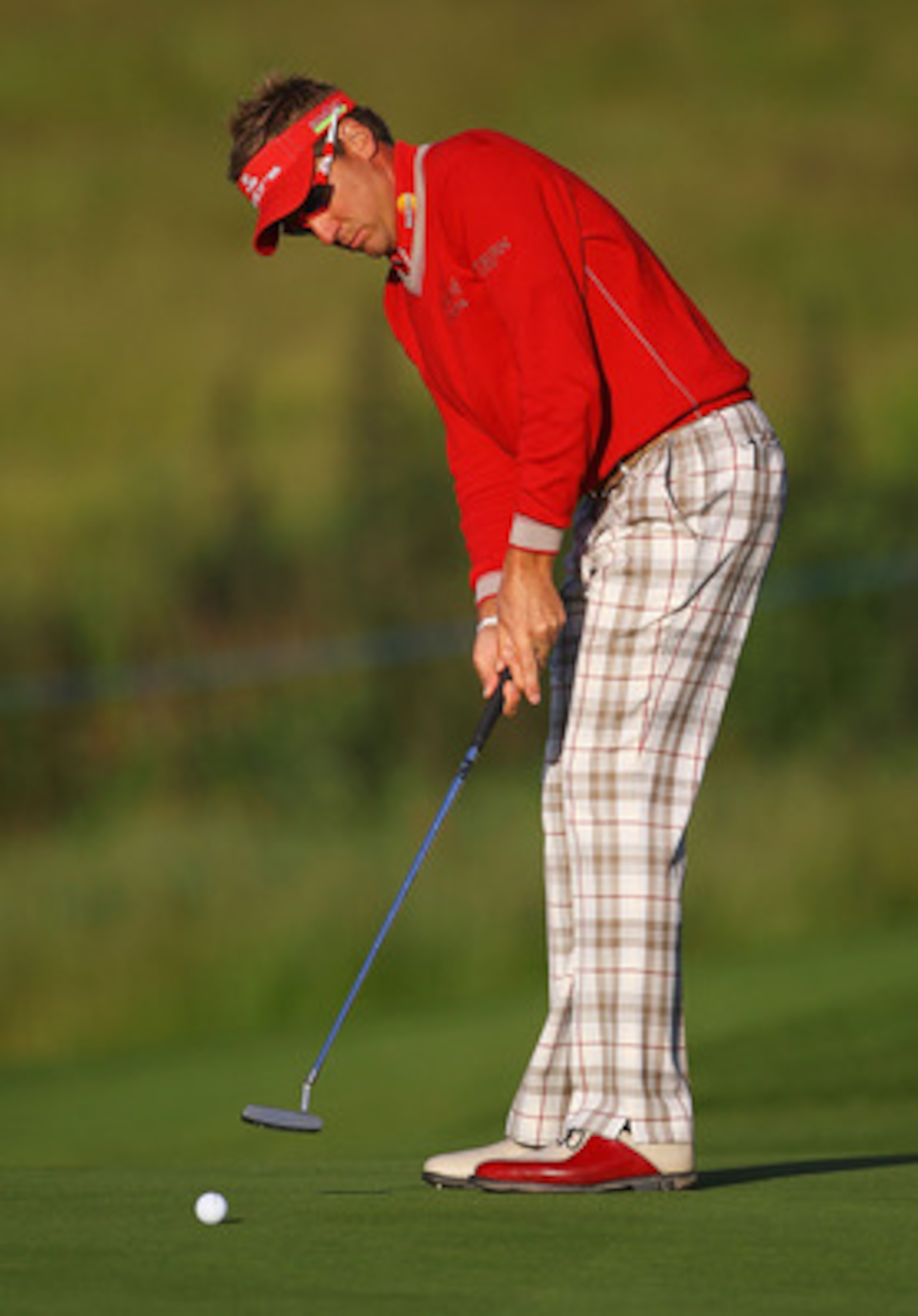 NEWPORT, WALES - MAY 30:  Ian Poulter of England makes a putt on the 4th green during the PowerPlay Ignition Golf on the Twenty Ten Course at the Celtic Manor Resort on May 30, 2011 in Newport, Wales.  (Photo by Matthew Lewis/Getty Images)