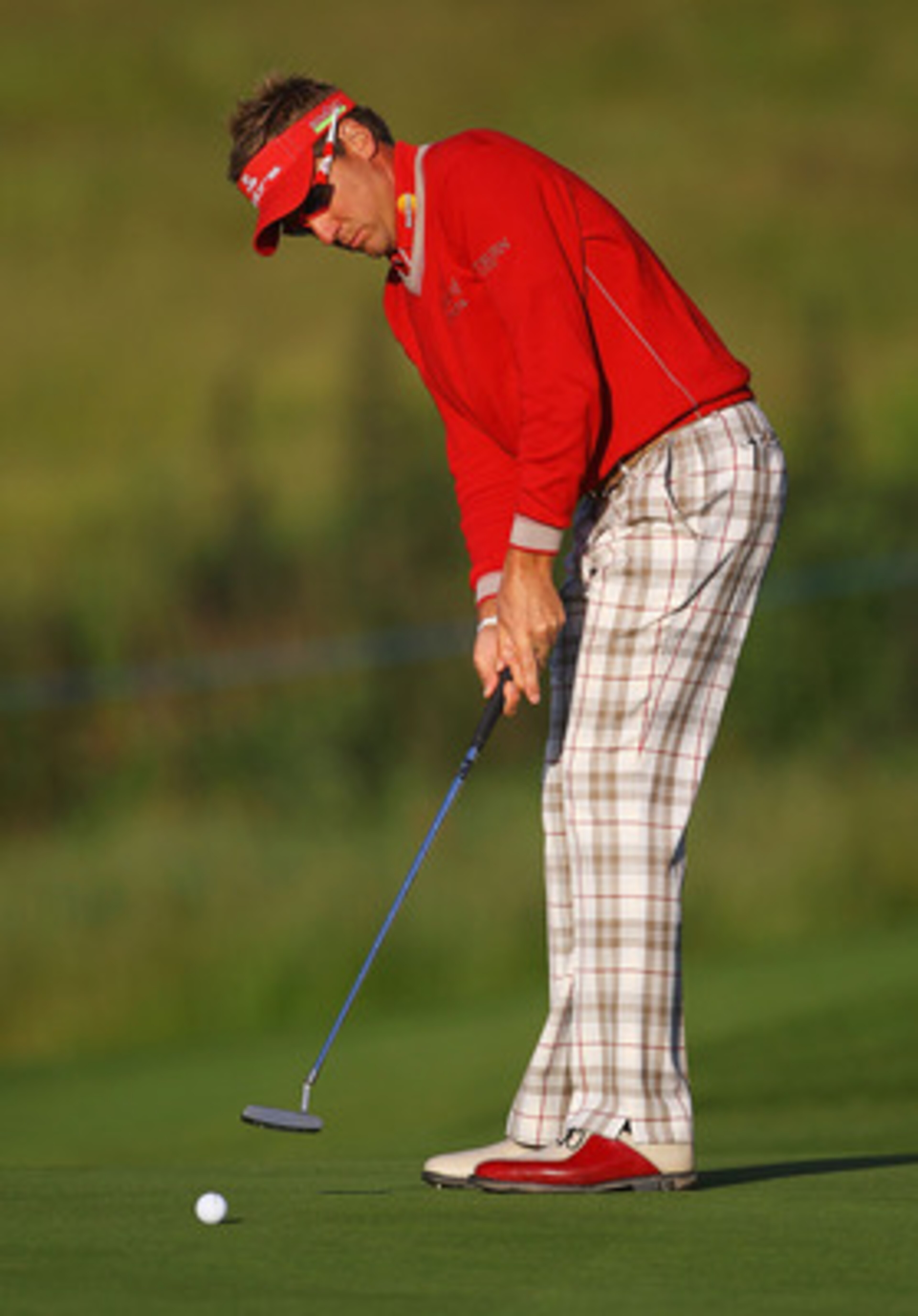 NEWPORT, WALES - MAY 30:  Ian Poulter of England makes a putt on the 4th green during the PowerPlay Ignition Golf on the Twenty Ten Course at the Celtic Manor Resort on May 30, 2011 in Newport, Wales.  (Photo by Matthew Lewis/Getty Images)