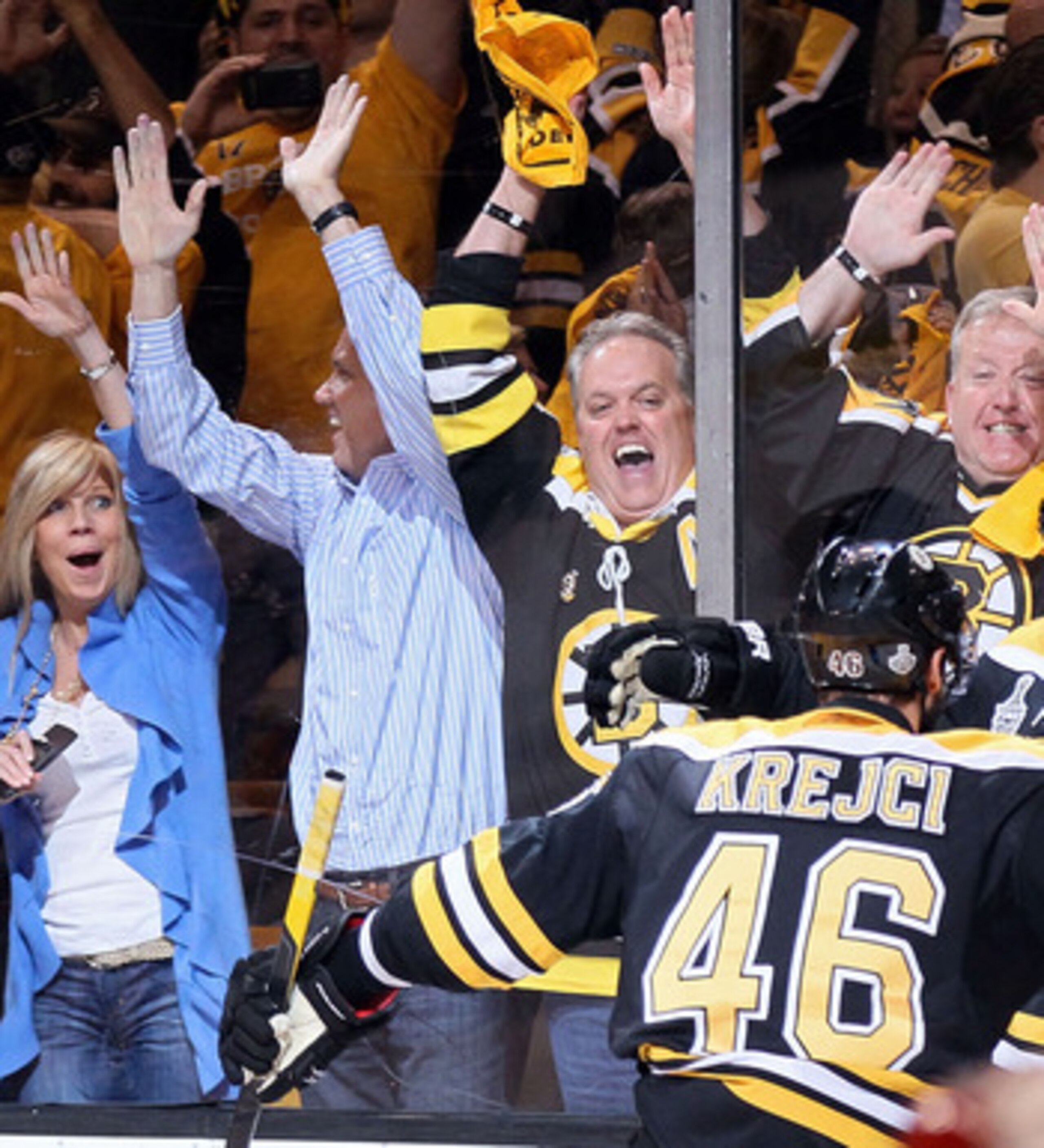 BOSTON, MA - JUNE 13:  Milan Lucic #17 of the Boston Bruins celebrates with David Krejci #46 after scoring a goal in the first period against Roberto Luongo #1 of the Vancouver Canucks during Game Six of the 2011 NHL Stanley Cup Final at TD Garden on June