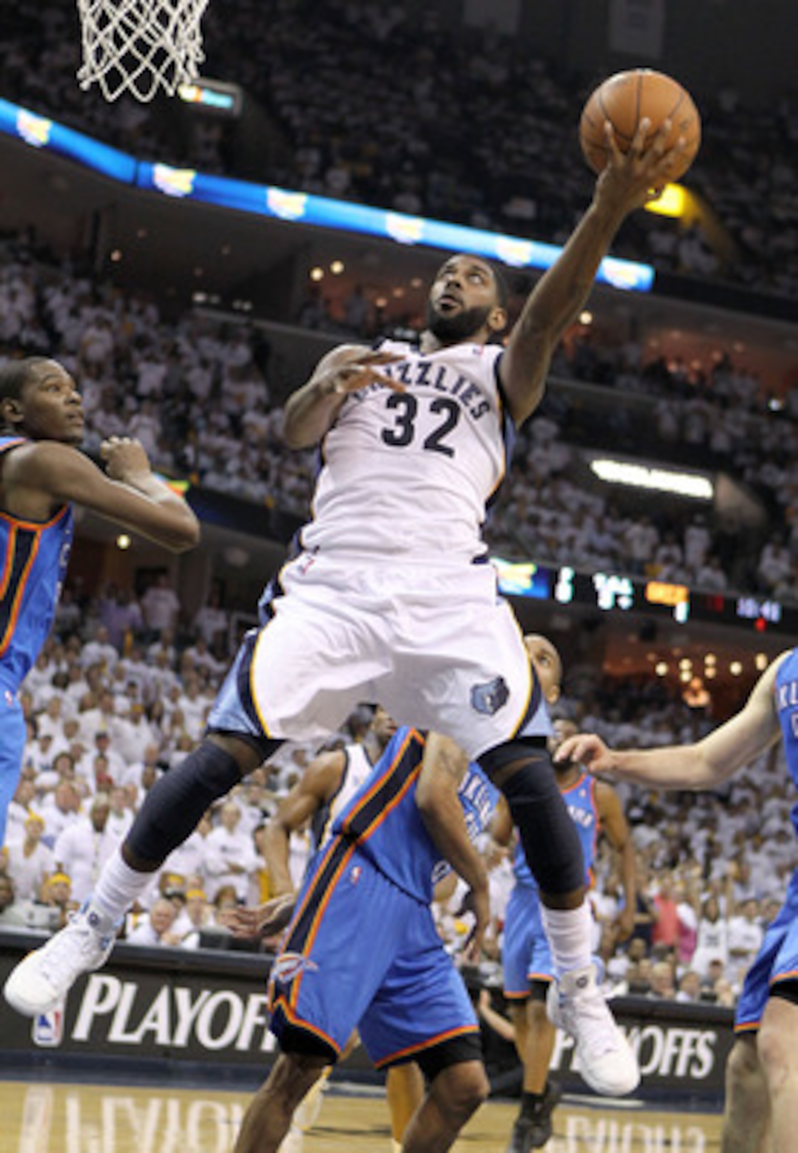 MEMPHIS, TN - MAY 07:  O.J. Mayo #32 of the  Memphis Grizzlies shoots the ball during the game against the Oklahoma City Thunder in Game Three of the Western Conference Semifinals in the 2011 NBA Playoffs at FedExForum on May 7, 2011 in Memphis, Tennessee