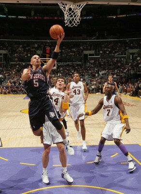 LOS ANGELES - NOVEMBER 27:  Jason Kidd #5 of the New Jersey Nets shoots against Luke Walton #4 of the Los Angeles Lakers November 27, 2005 at Staples Center in Los Angeles, California. The Nets won, 102-96, in overtime. NOTE TO USER: User expressly acknow