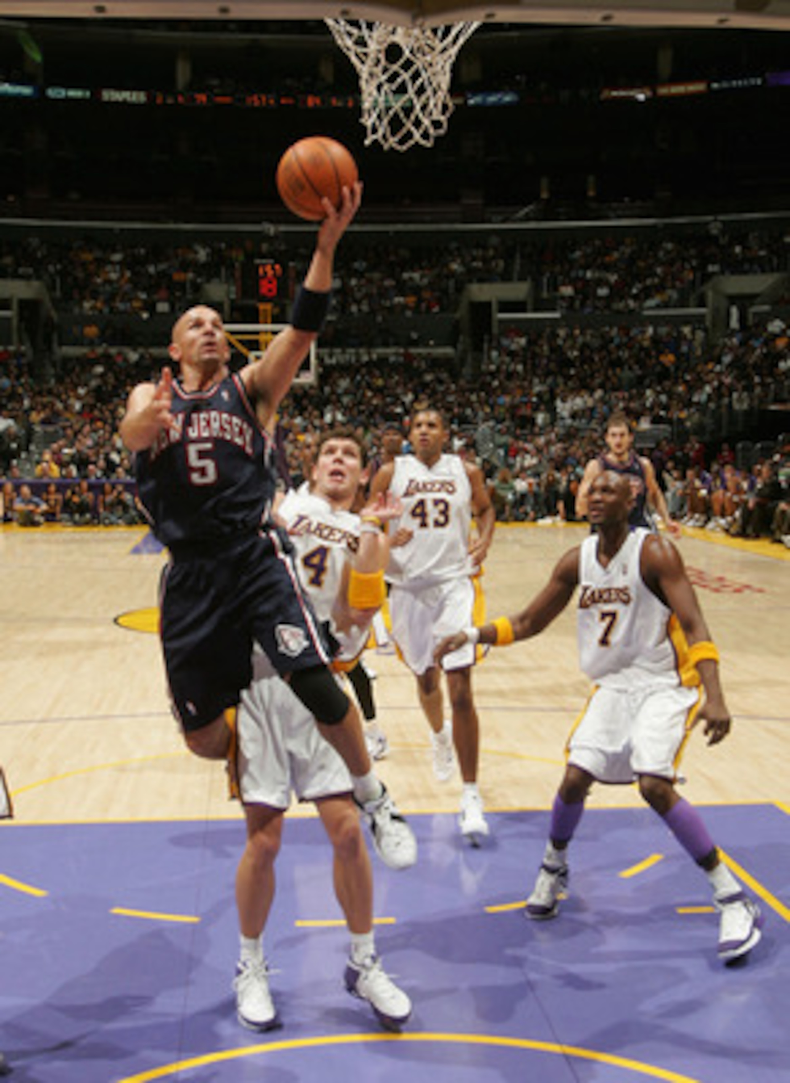 LOS ANGELES - NOVEMBER 27:  Jason Kidd #5 of the New Jersey Nets shoots against Luke Walton #4 of the Los Angeles Lakers November 27, 2005 at Staples Center in Los Angeles, California. The Nets won, 102-96, in overtime. NOTE TO USER: User expressly acknow