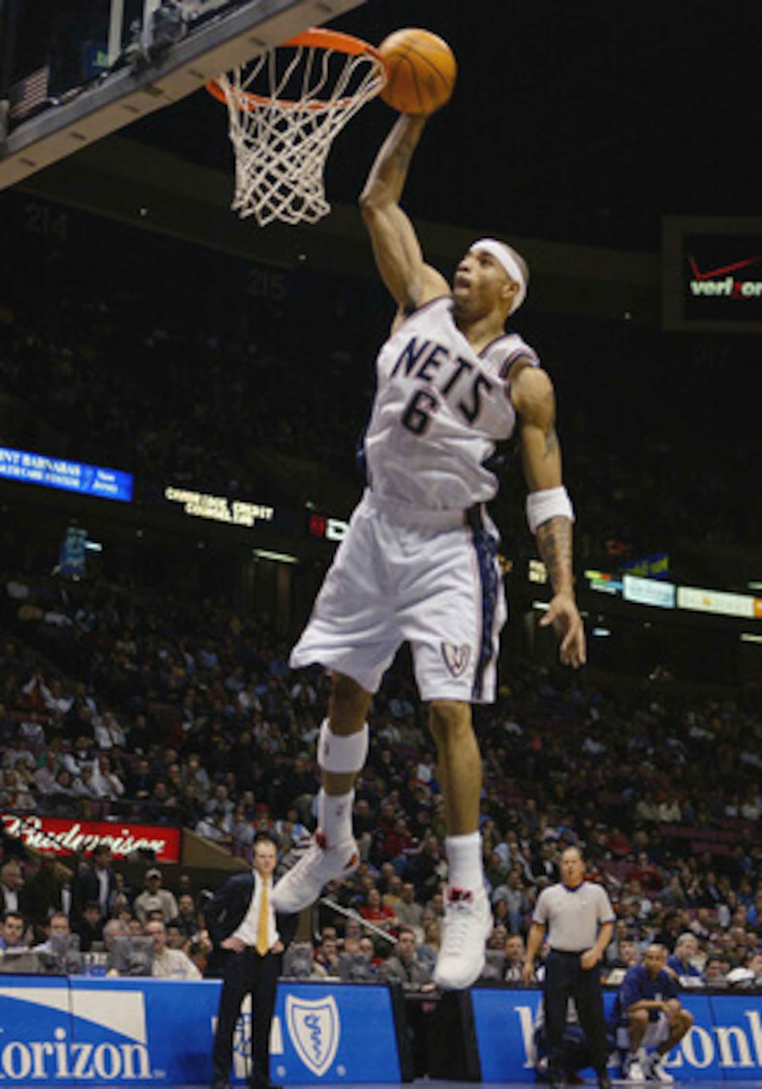 EAST RUTHERFORD, NJ - FEBRUARY 18:  Kenyon Martin #6 of the New Jersey Nets dunks the ball during the game against the Atlanta Hawks at Continental Airlines Arena on February 18, 2004 in East Rutherford, New Jersey.  The Nets won 98-92.  NOTE TO USER: Use