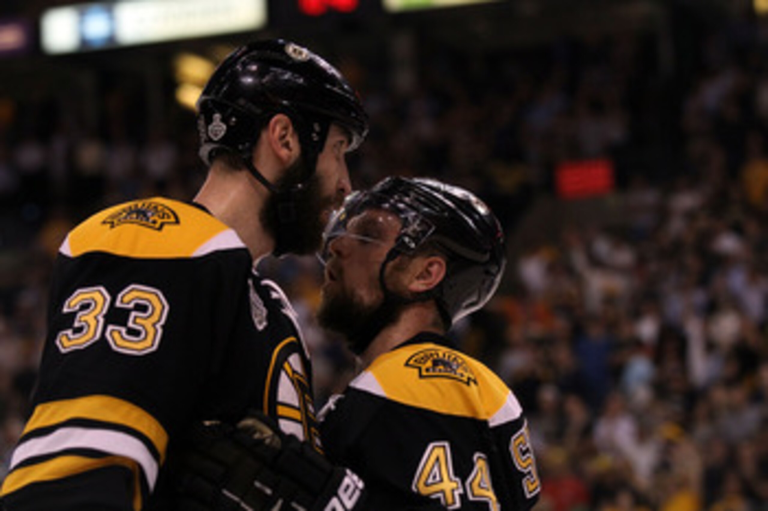 BOSTON, MA - JUNE 08:  Zdeno Chara #33 and Dennis Seidenberg #44 of the Boston Bruins talk during Game Four against the Vancouver Canucks of the 2011 NHL Stanley Cup Final at TD Garden on June 8, 2011 in Boston, Massachusetts.  (Photo by Elsa/Getty Images