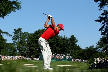 BETHESDA, MD - JUNE 14:  Dustin Johnson hits a shot during a practice round prior to the start of the 111th U.S. Open at Congressional Country Club on June 14, 2011 in Bethesda, Maryland.  (Photo by Andrew Redington/Getty Images)