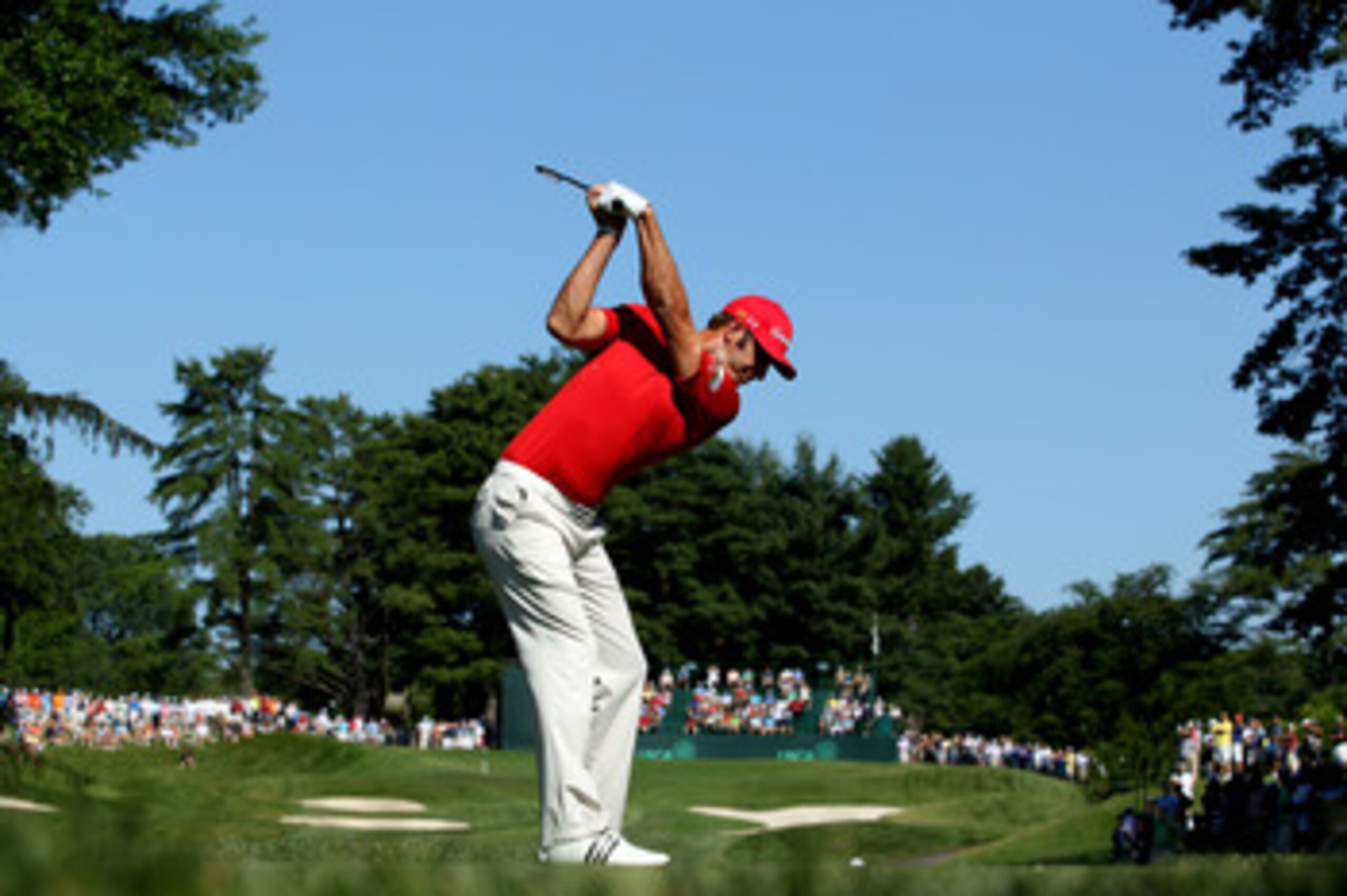 BETHESDA, MD - JUNE 14:  Dustin Johnson hits a shot during a practice round prior to the start of the 111th U.S. Open at Congressional Country Club on June 14, 2011 in Bethesda, Maryland.  (Photo by Andrew Redington/Getty Images)