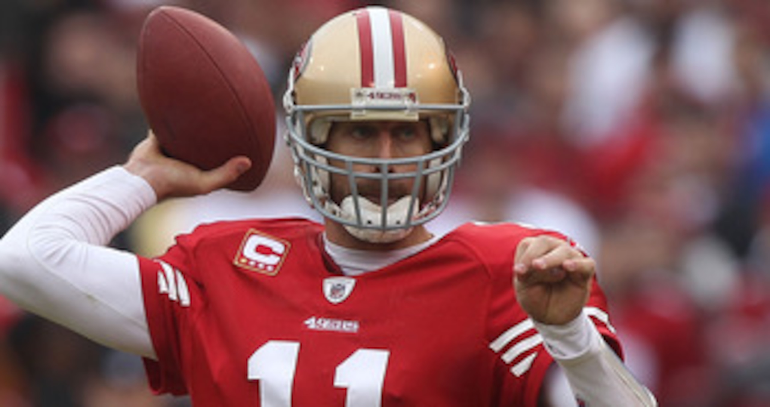 SAN FRANCISCO - DECEMBER 12:  Alex Smith #11 of the San Francisco 49ers passes against the Seattle Seahawks during an NFL game at Candlestick Park on December 12, 2010 in San Francisco, California.(Photo by Jed Jacobsohn/Getty Images)