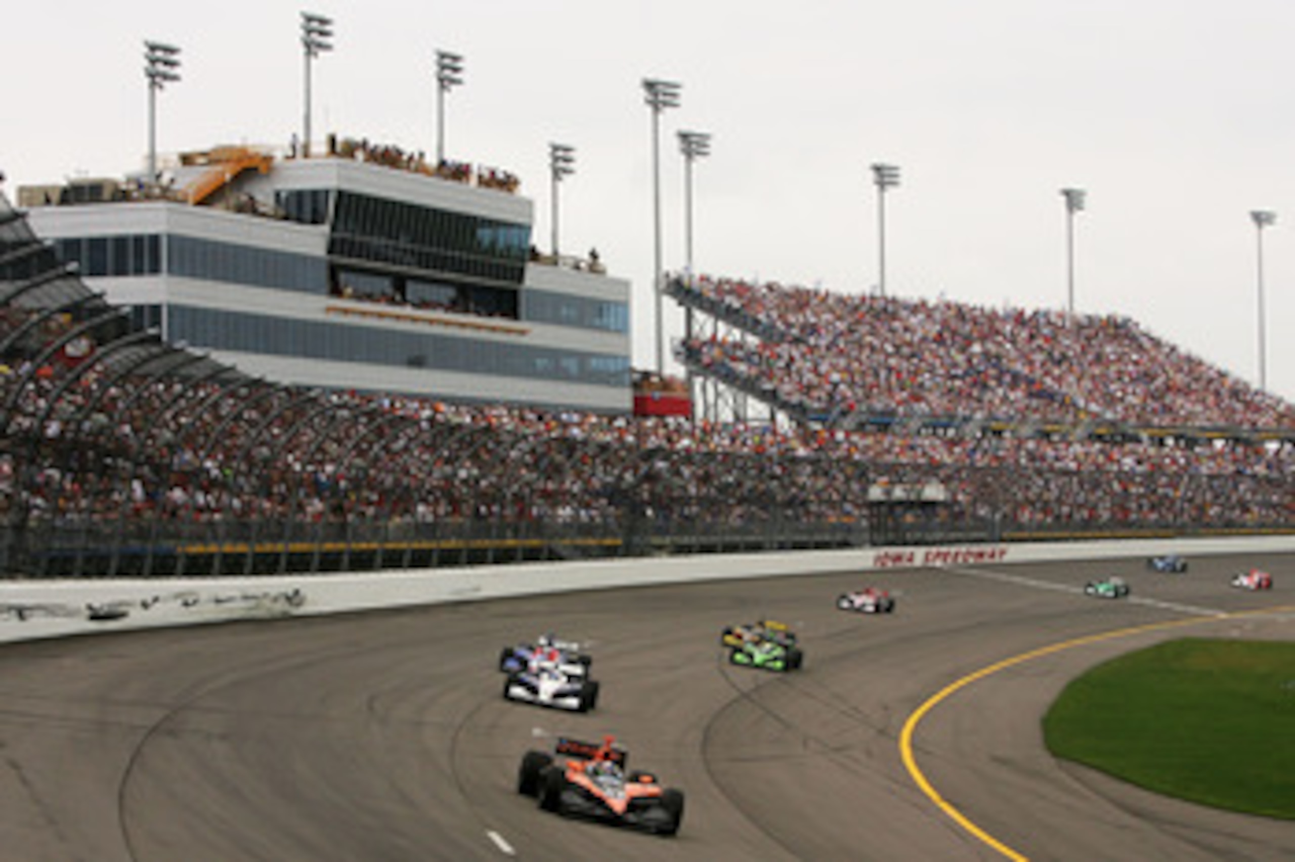 NEWTON, IA - JUNE 24:  Dario Franchitti drives the #27 Canadian Club Andretti Green racing Dallara Honda around turn one during the IRL Indycar Series Iowa Corn Indy 250 on June 24, 2007 at the Iowa Speedway in Newton, Iowa.  (Photo by Chris McGrath/Getty