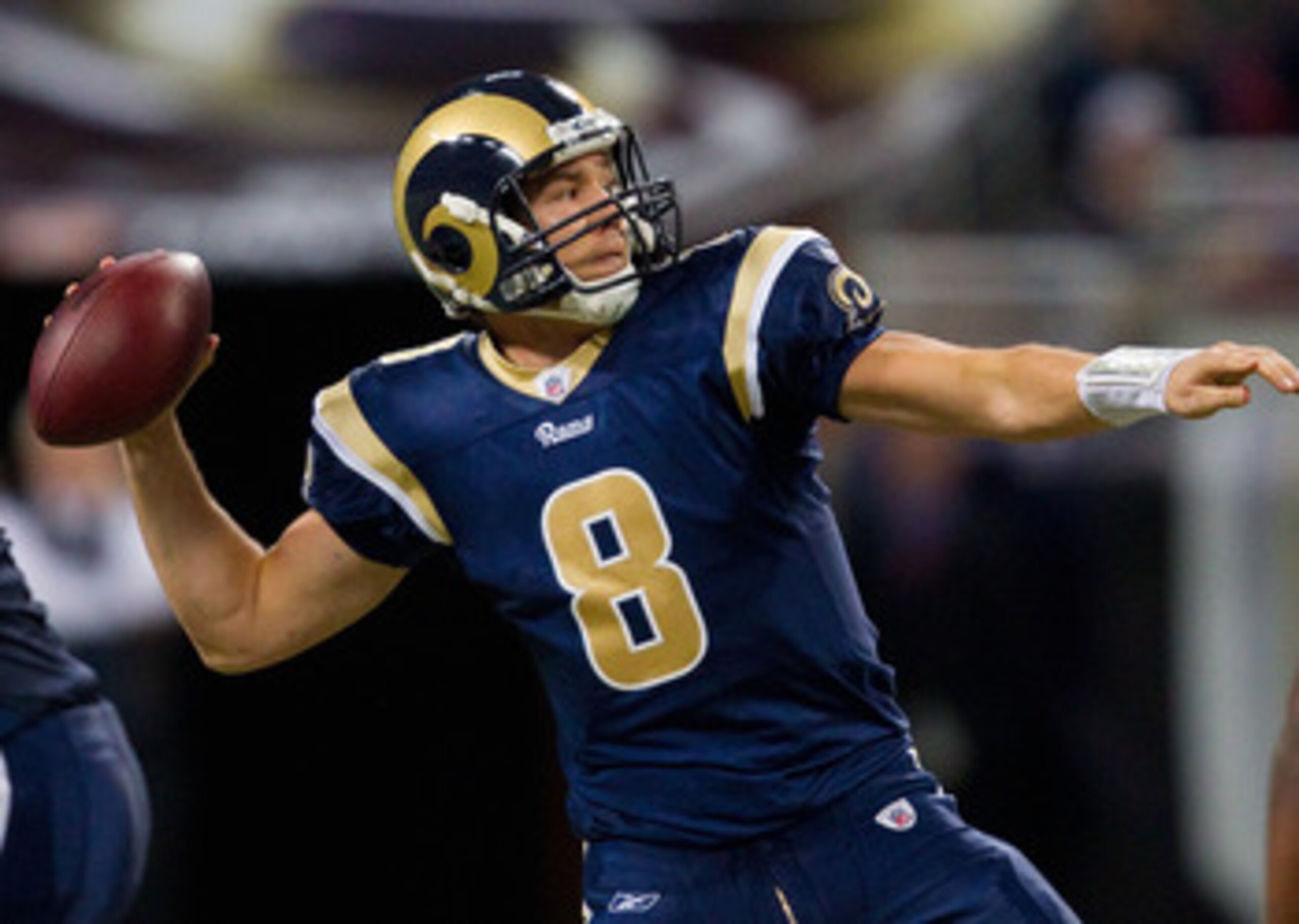 ST. LOUIS, MO - DECEMBER 26: Sam Bradford #8 of the St. Louis Rams passes against the San Francisco 49ers at the Edward Jones Dome on December 26, 2010 in St. Louis, Missouri. The Rams beat the 49ers 25-17. (Photo by Dilip Vishwanat/Getty Images)