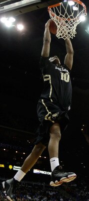 KANSAS CITY, MO - MARCH 11:  Alec Burks #10 of the Colorado Buffaloes dunks the ball against the Kansas Jayhawks during their semifinal game in the 2011 Phillips 66 Big 12 Men's Basketball Tournament at Sprint Center on March 11, 2011 in Kansas City, Miss