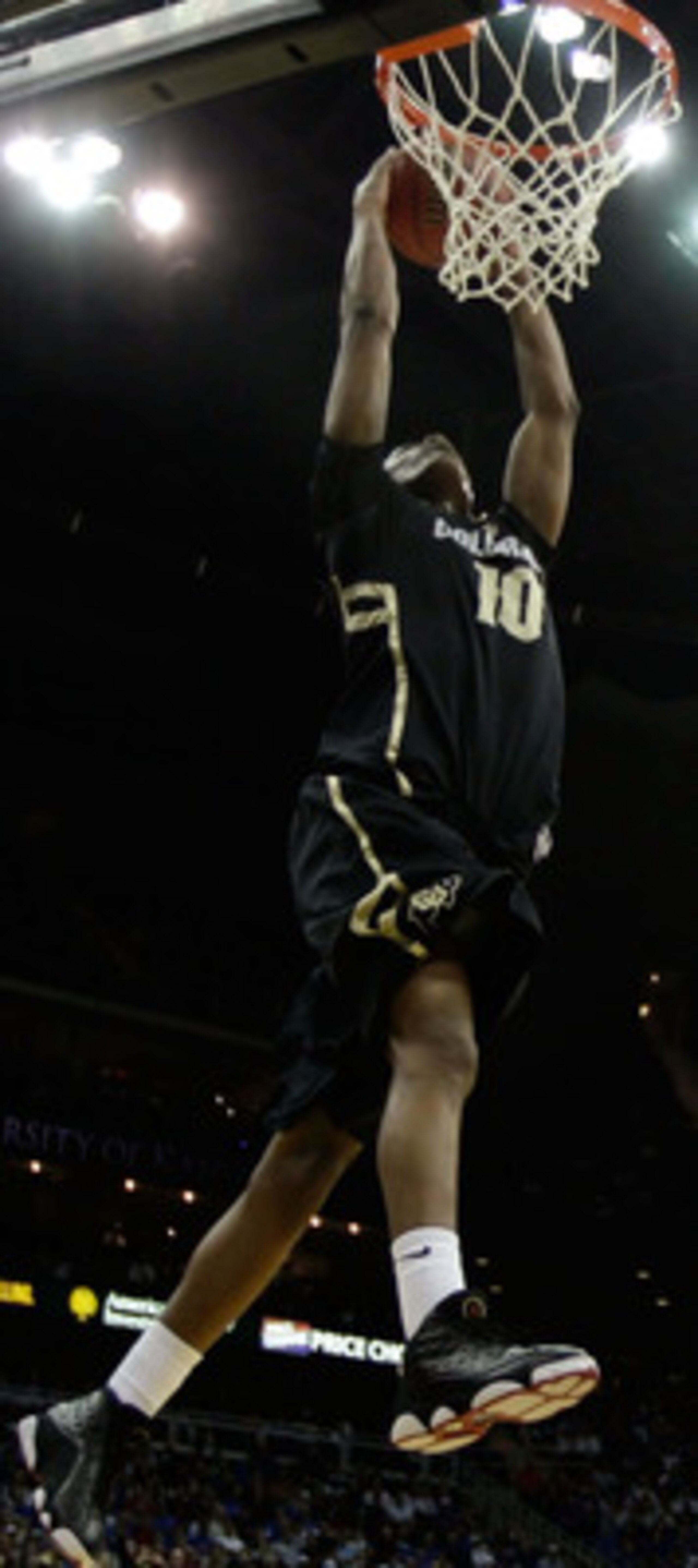KANSAS CITY, MO - MARCH 11:  Alec Burks #10 of the Colorado Buffaloes dunks the ball against the Kansas Jayhawks during their semifinal game in the 2011 Phillips 66 Big 12 Men's Basketball Tournament at Sprint Center on March 11, 2011 in Kansas City, Miss